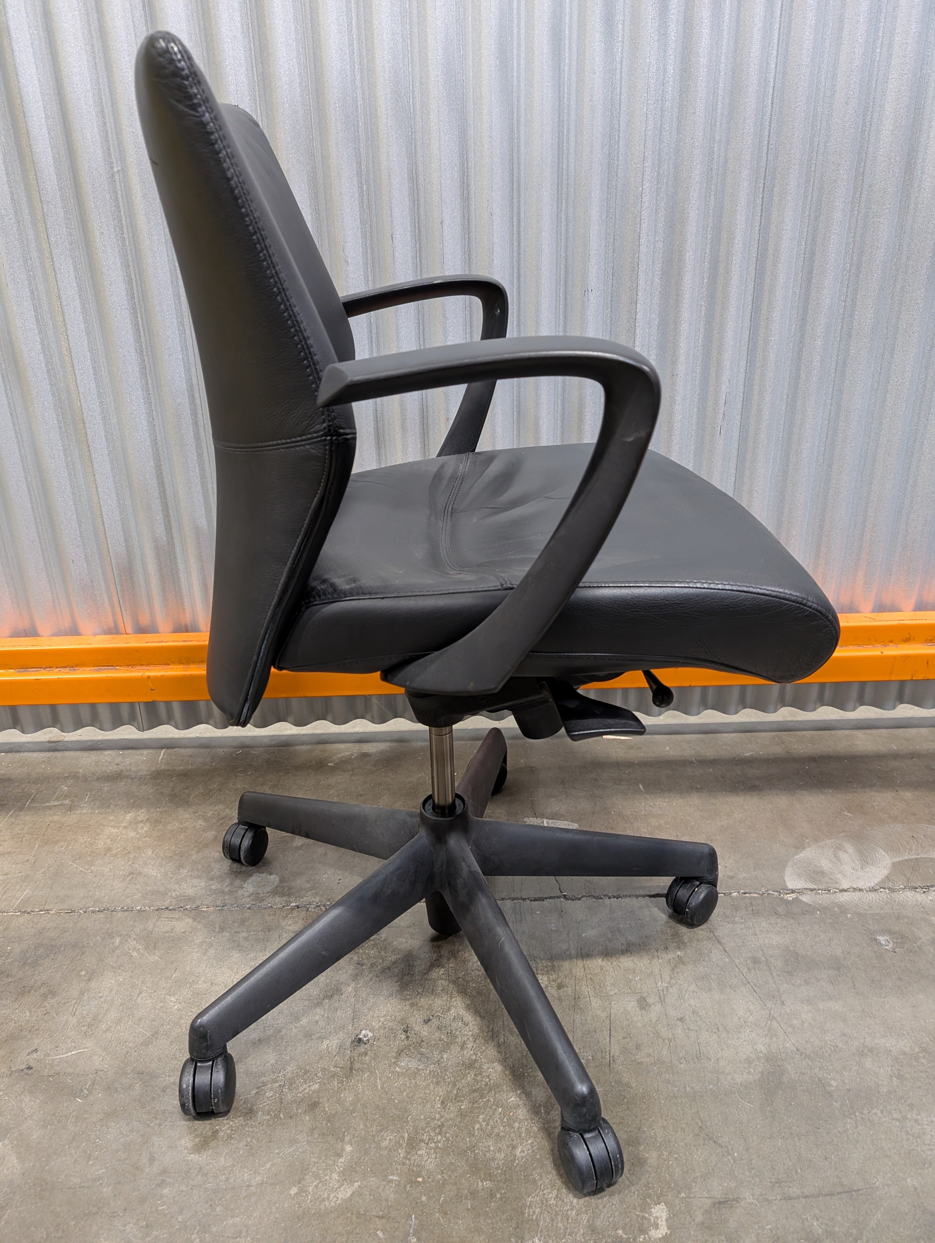 Sleek Black Leather Office Chair with Arms