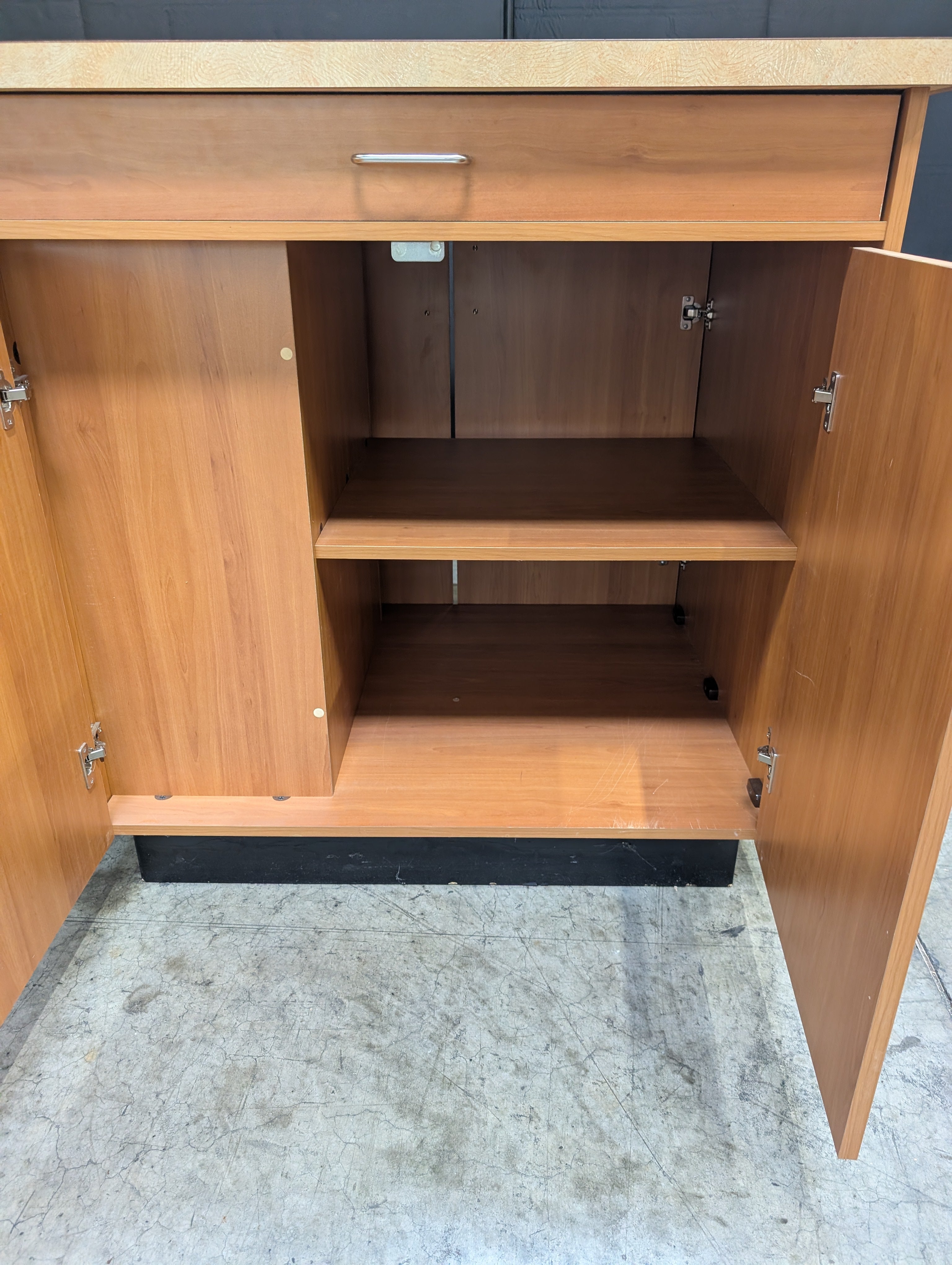 Two-Door Base Cabinet with Speckled Laminate Countertop