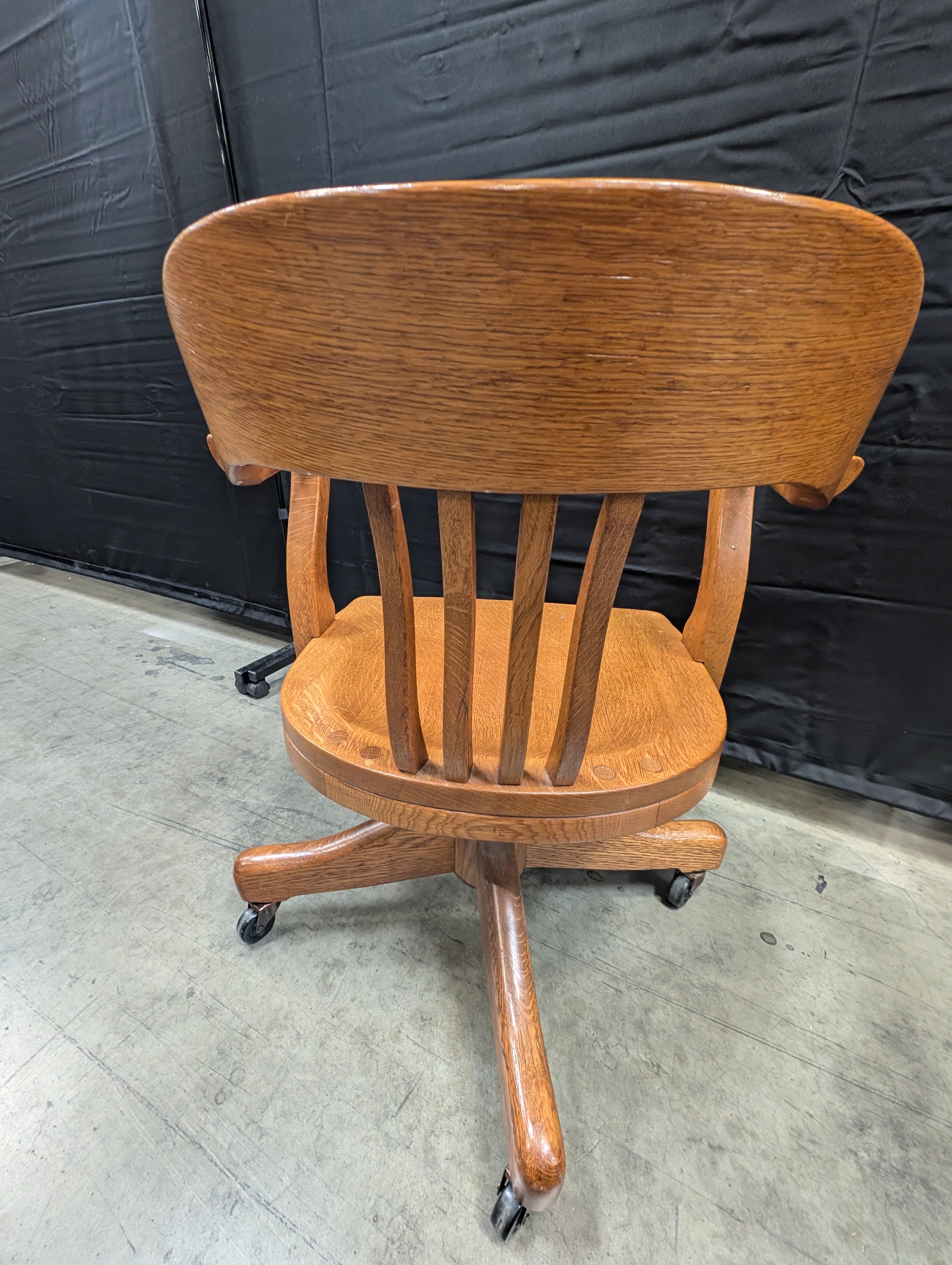 Damaged Wooden Swivel Office Chair with Casters