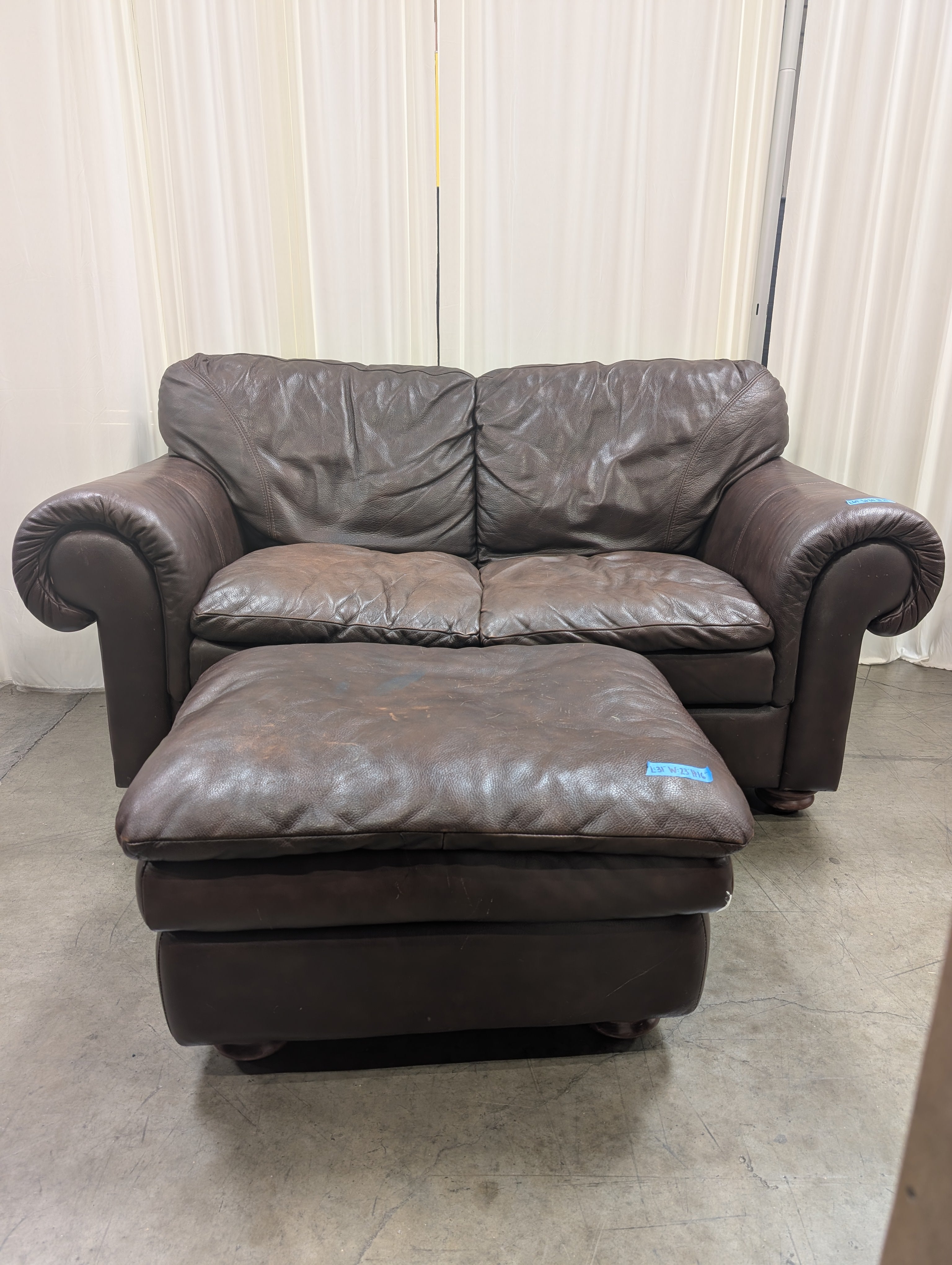 Dark Brown Leather Rolled Arm Couch with matching Ottoman