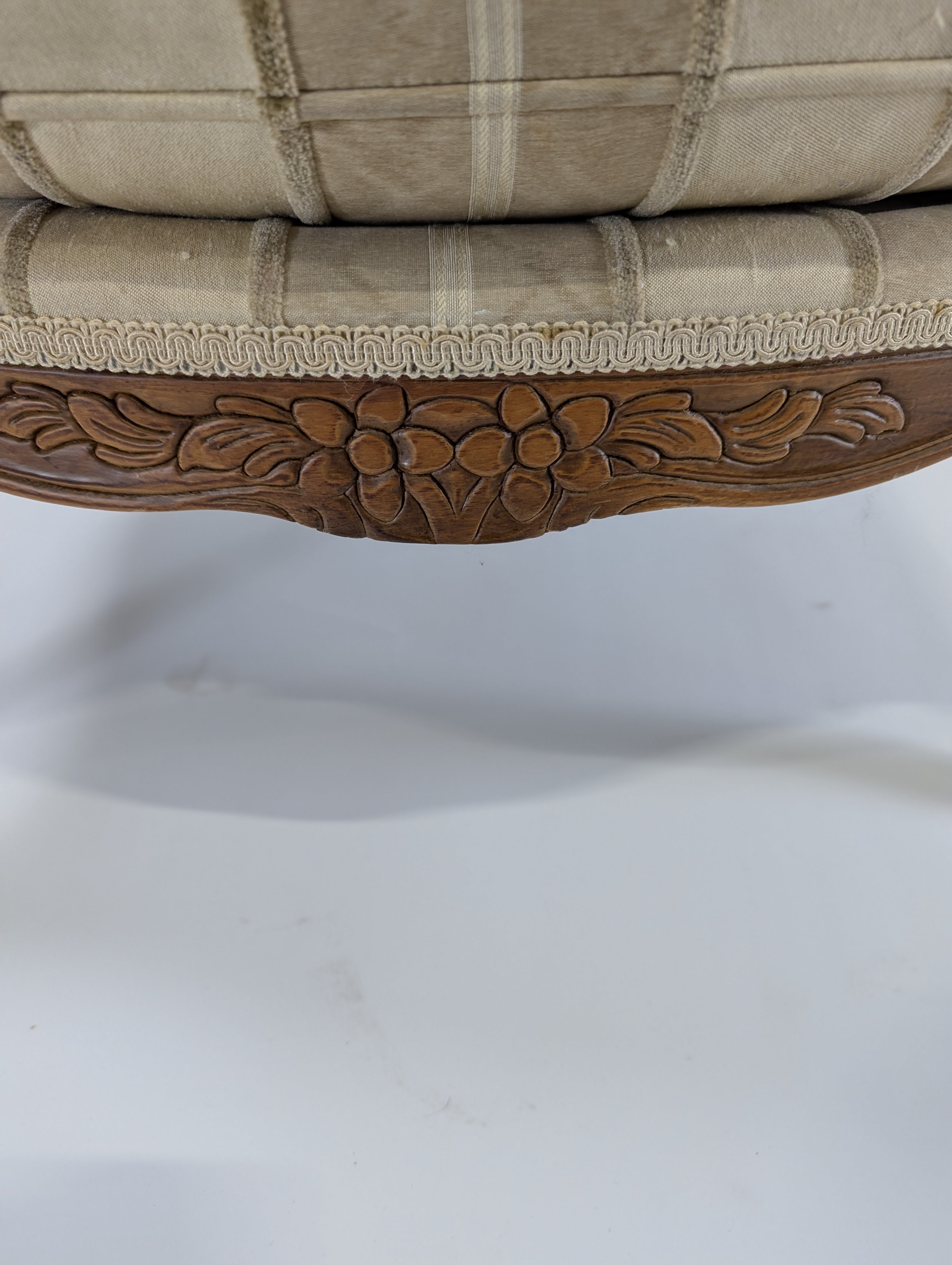 Ornate Carved Wood Armchair with Striped Upholstery