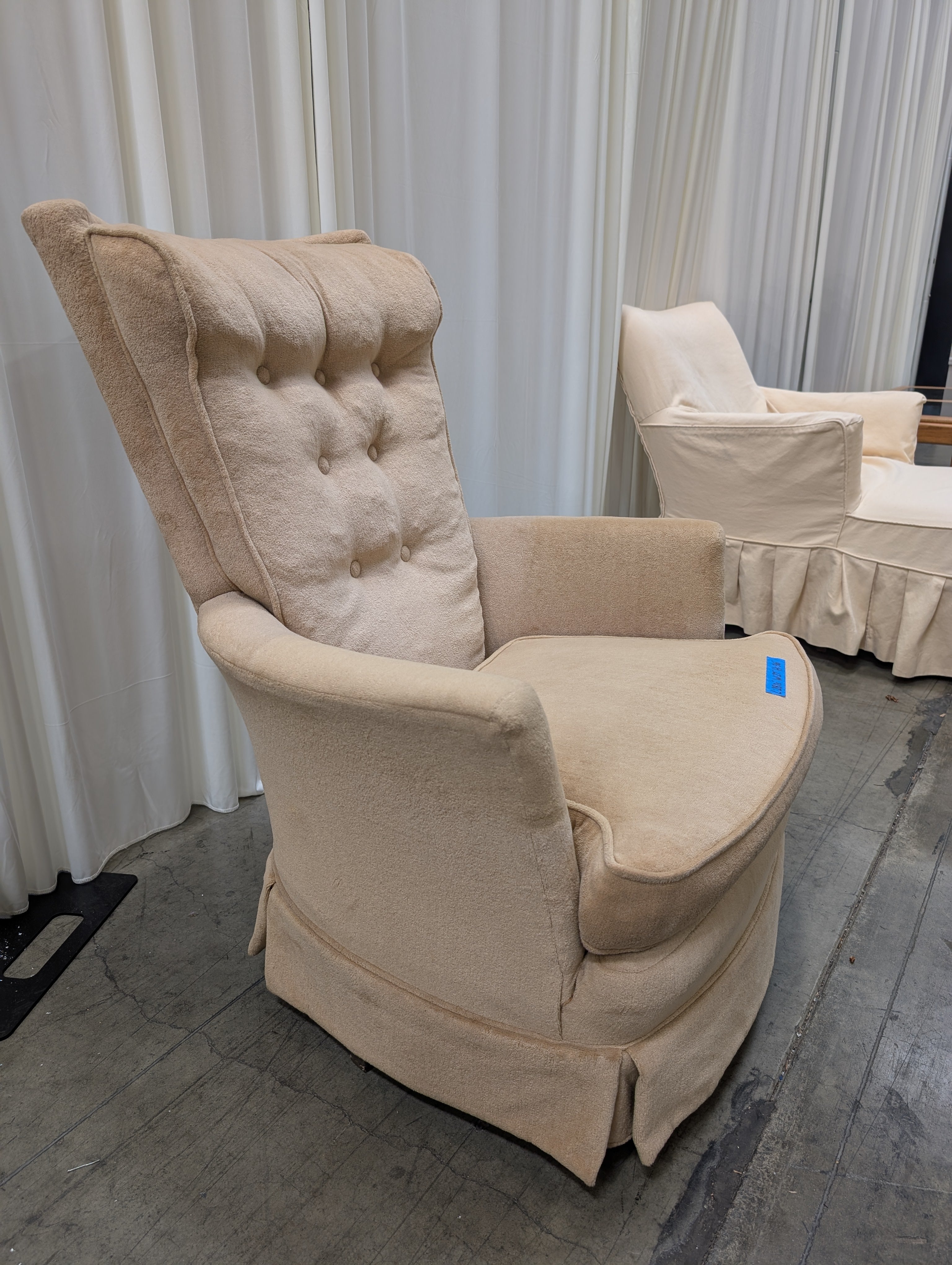 Peach Tufted Fabric Recliner with Skirted Base