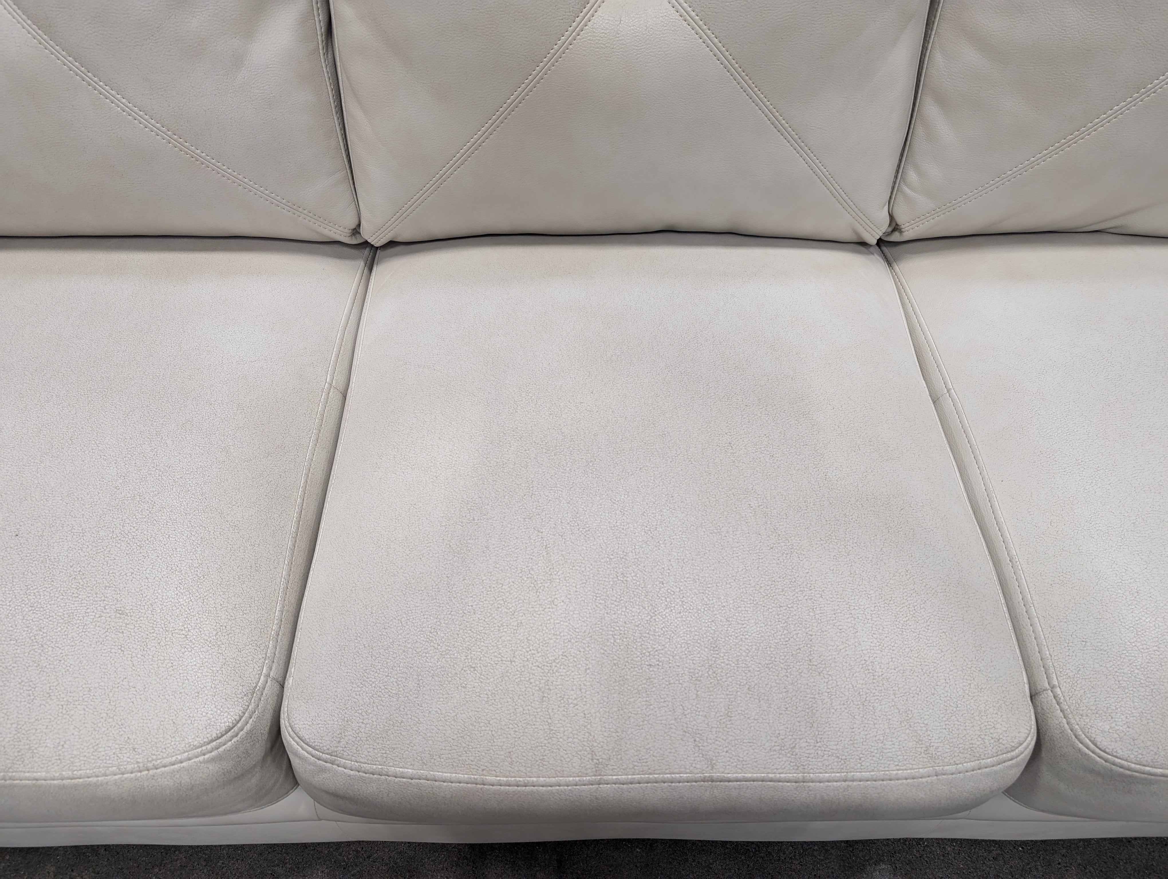 Light Beige Tufted Three-Seater Sofa