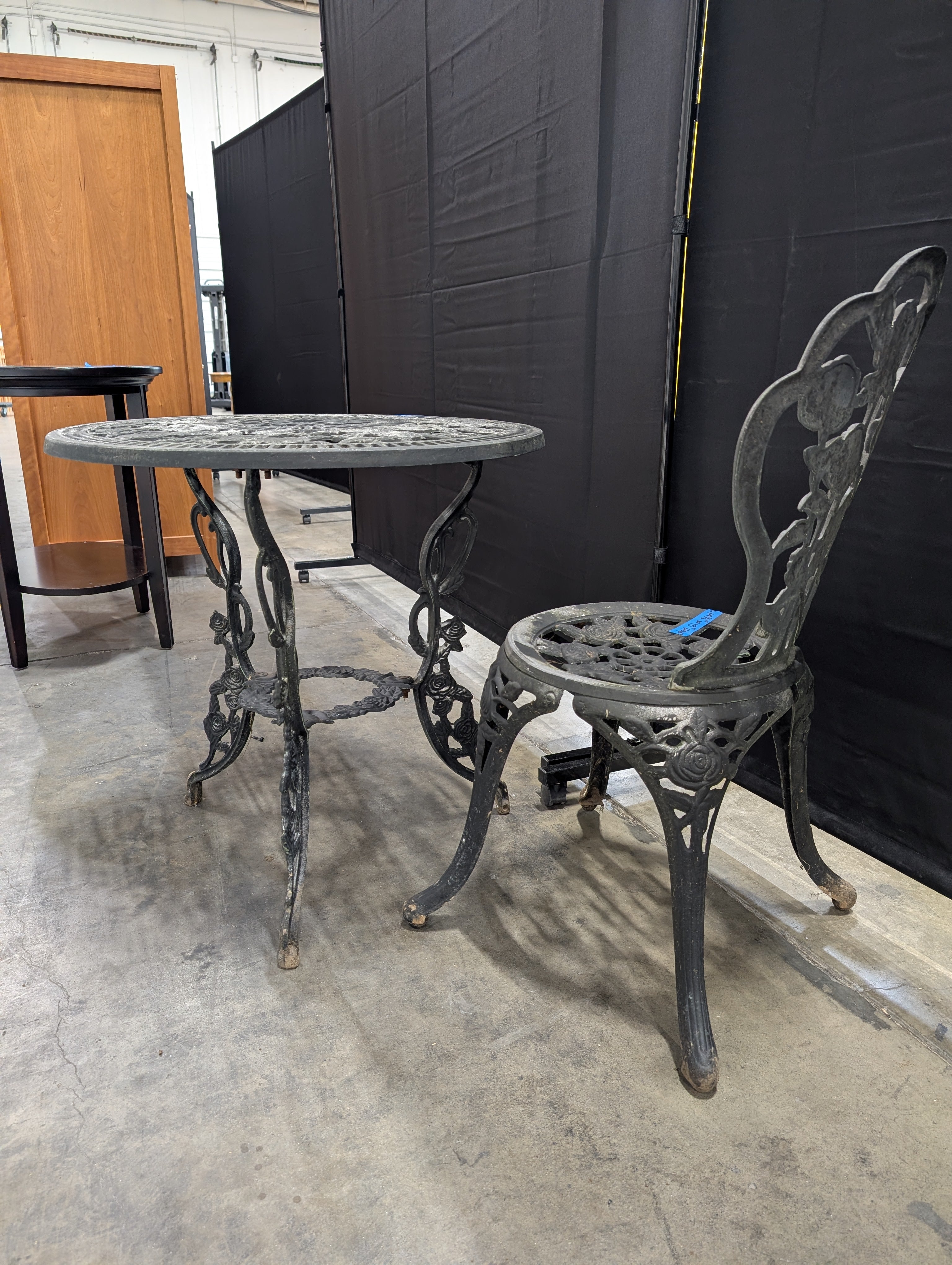 Round Black Cast Iron End Table with Floral Pattern