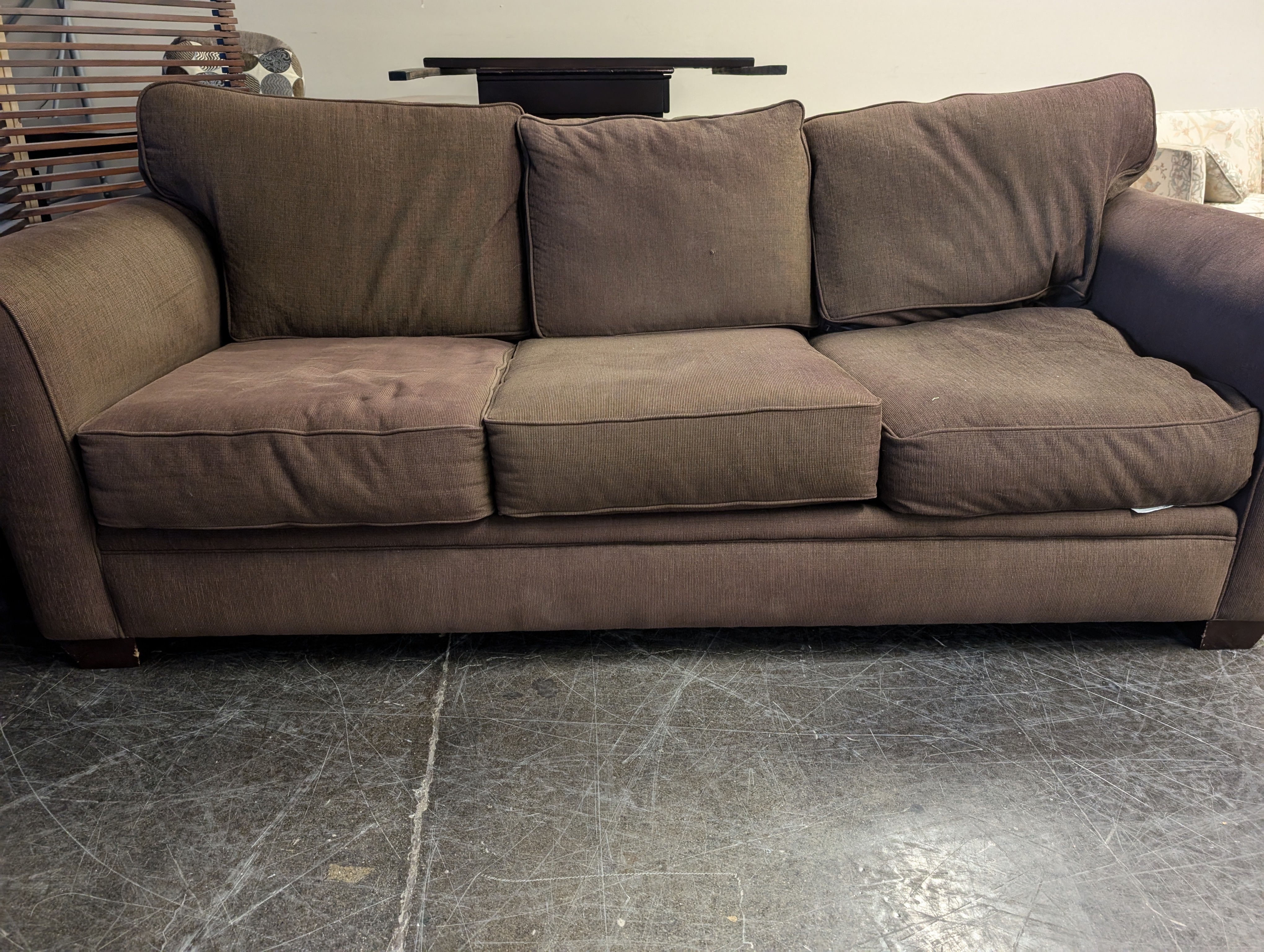 Comfortable Muted Brown Three-Seater Sofa