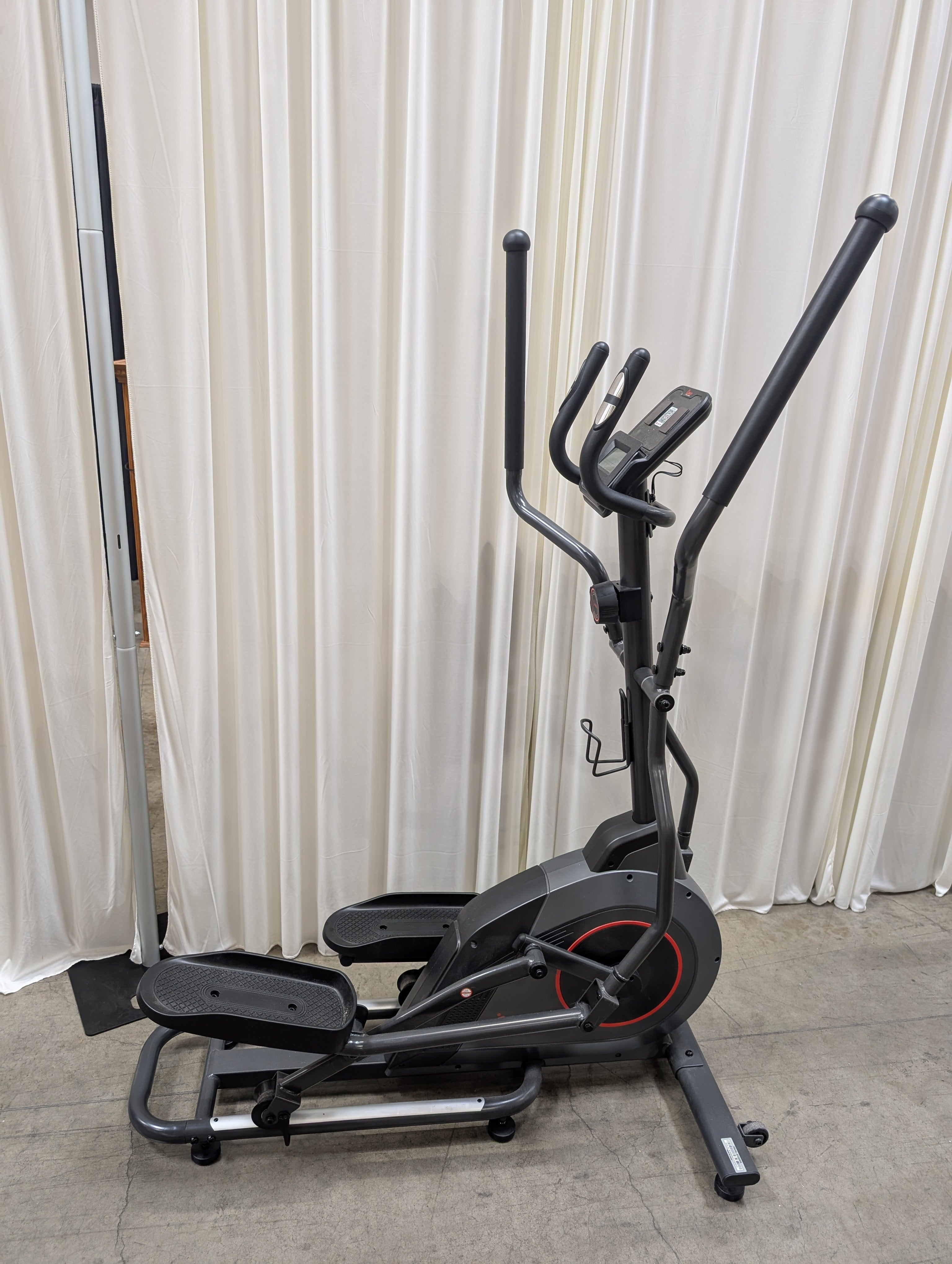 Black Magnetic Elliptical Trainer with Red Accents