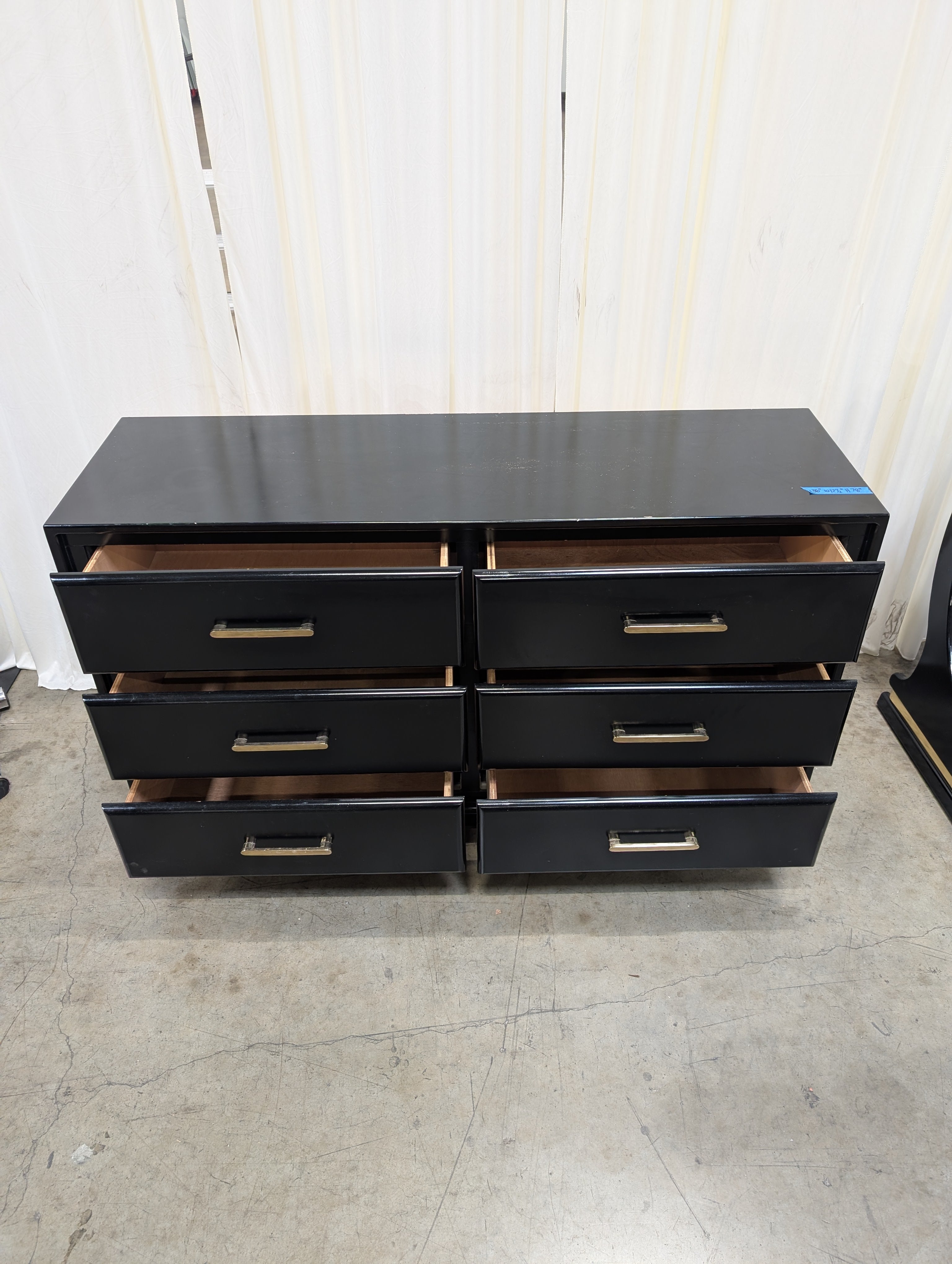 Contemporary Black Multi-Drawer Storage Cabinet with Gold Tone Pulls
