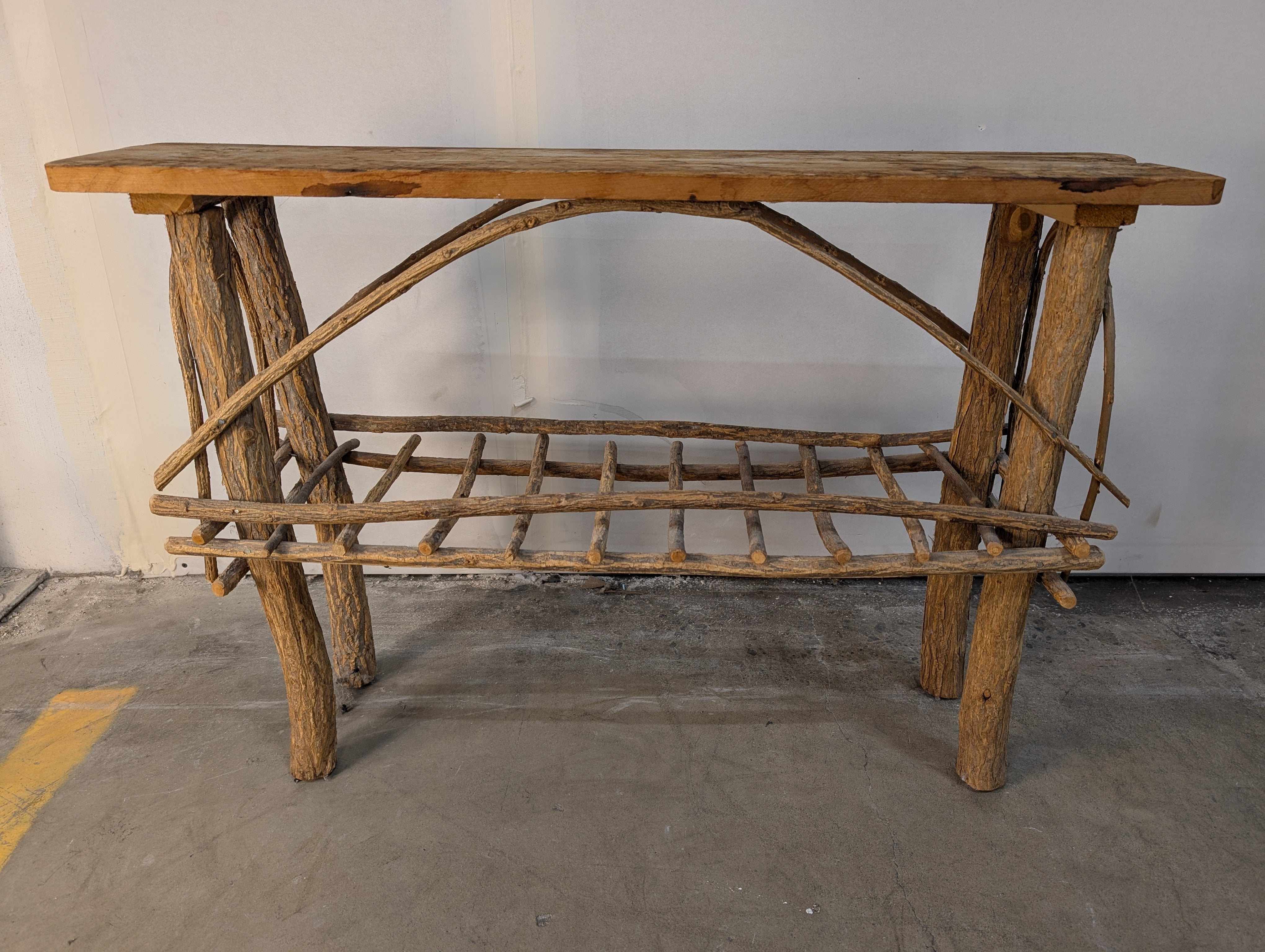 Rustic Natural Wood Plank Console Table with Twig Base