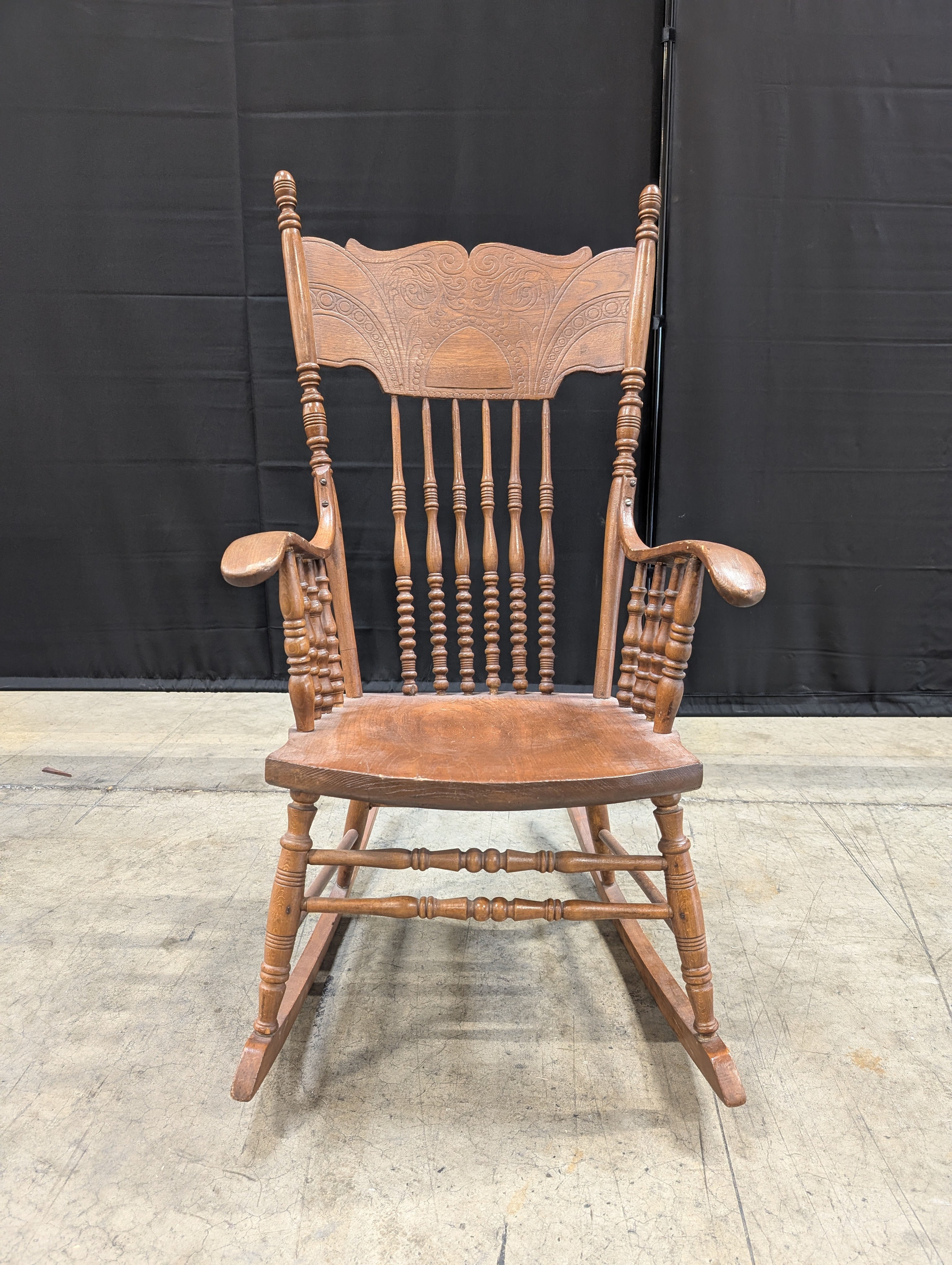 Classic Hardwood Rocking Chair with Ornate Carved Backrest