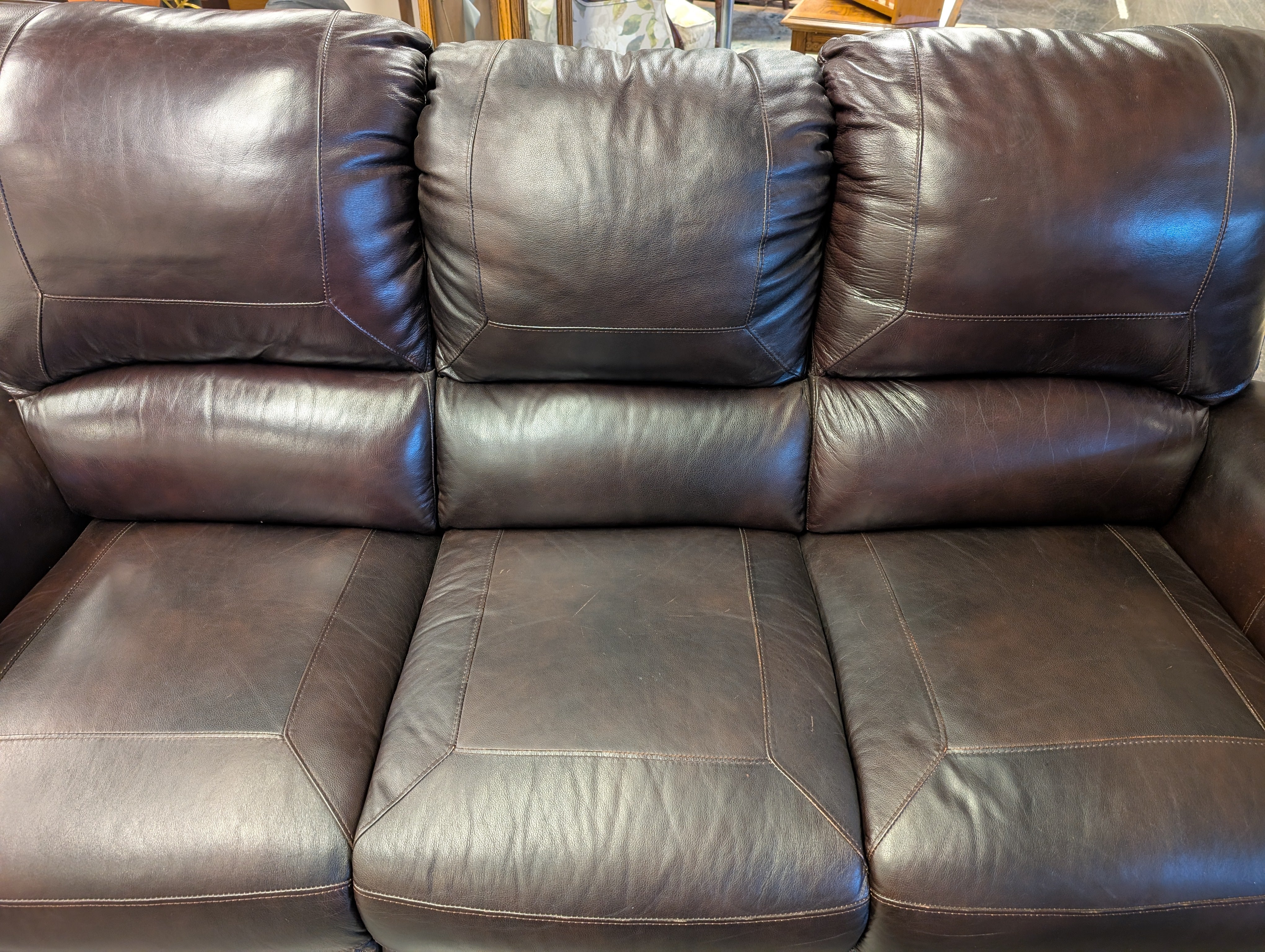 Dark Brown Three-Seat Reclining Sofa with Nailhead Trim