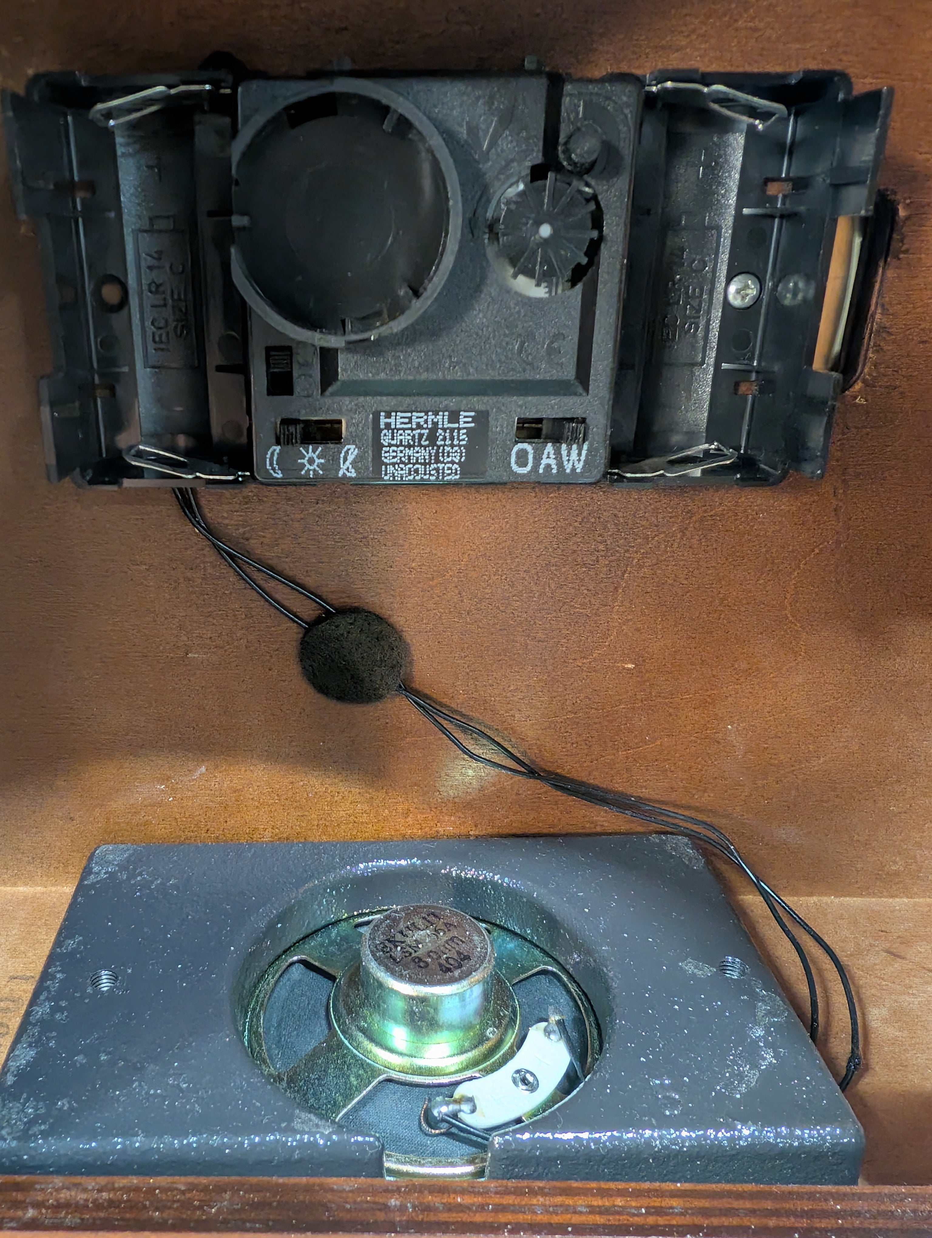 Curved Dark Wood Table Clock with Brass Tone Bezel