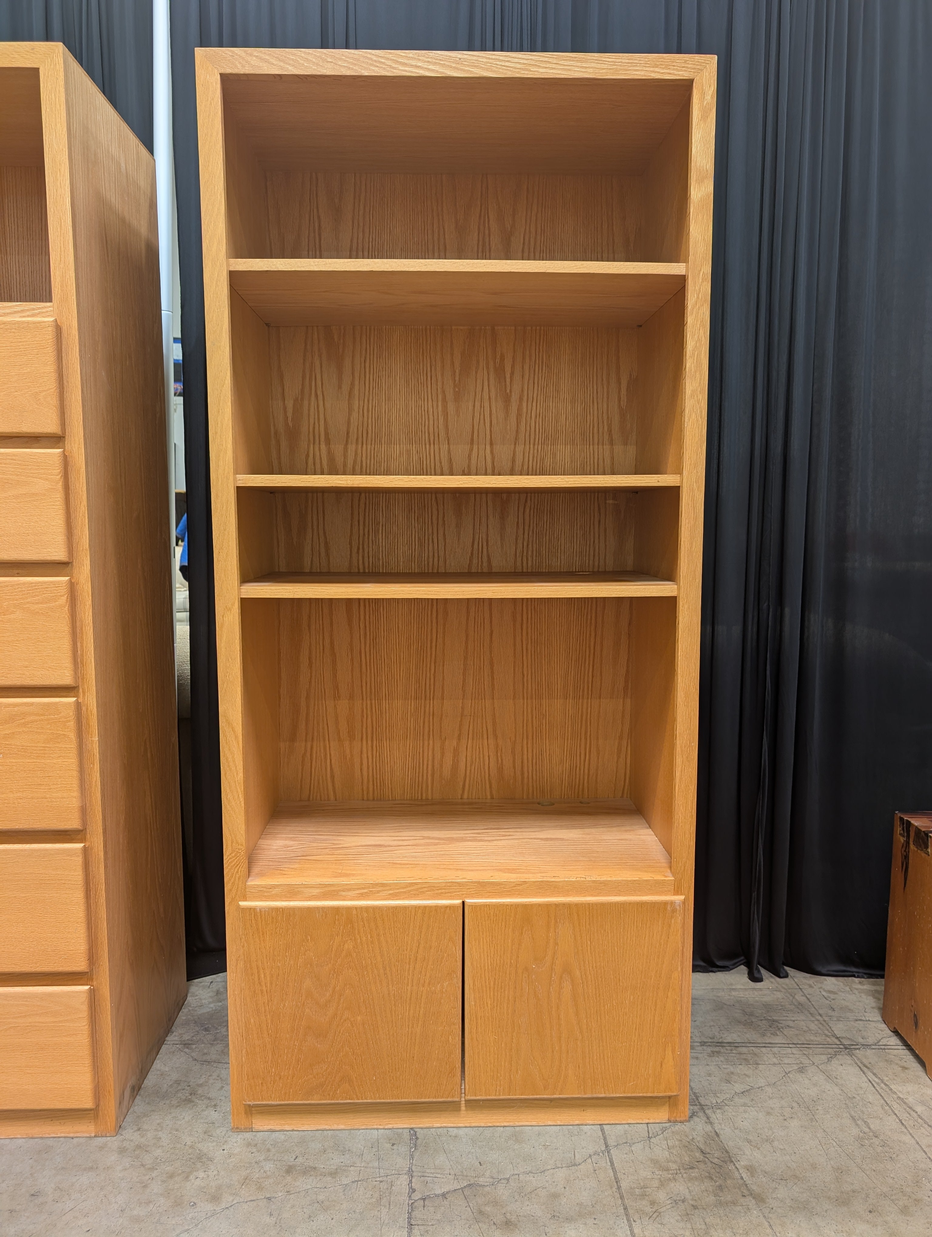 Light Brown Wood Bookcase with Three Shelves and Lower Cabinets