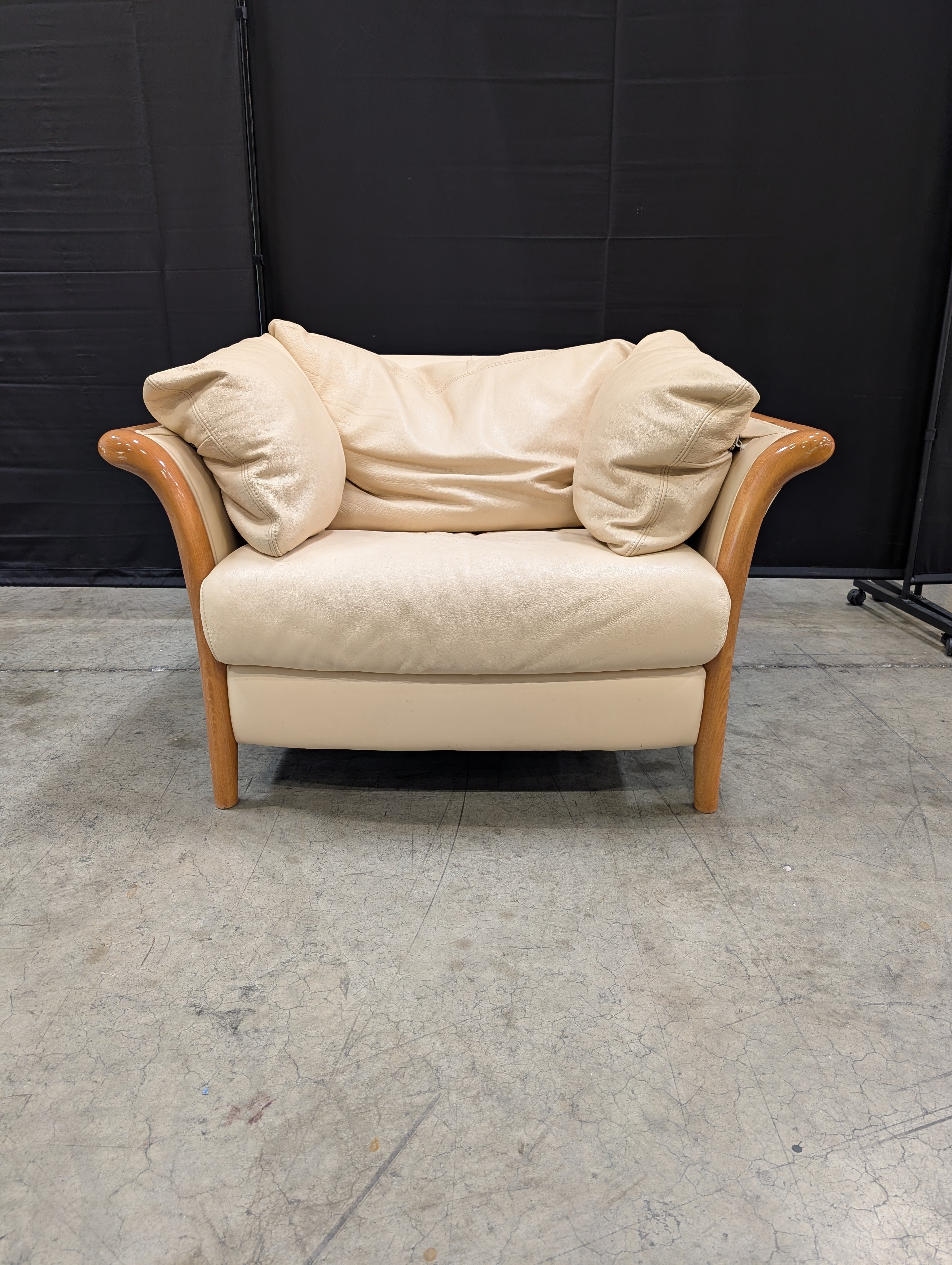 Beige leather Chair with Exposed Wood Frame