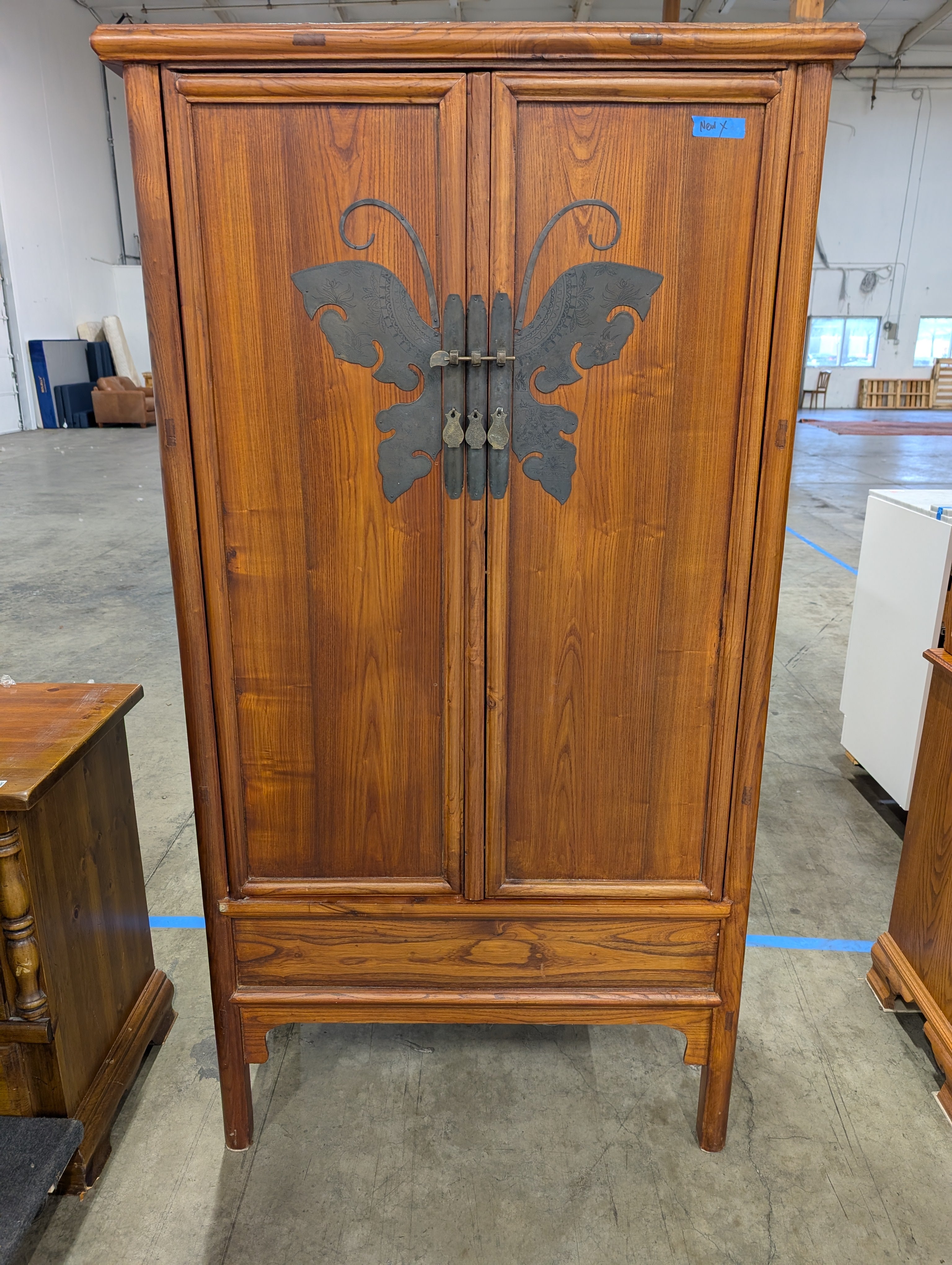 Ornate Hardwood Storage Cabinet with Decorative Butterfly Latch