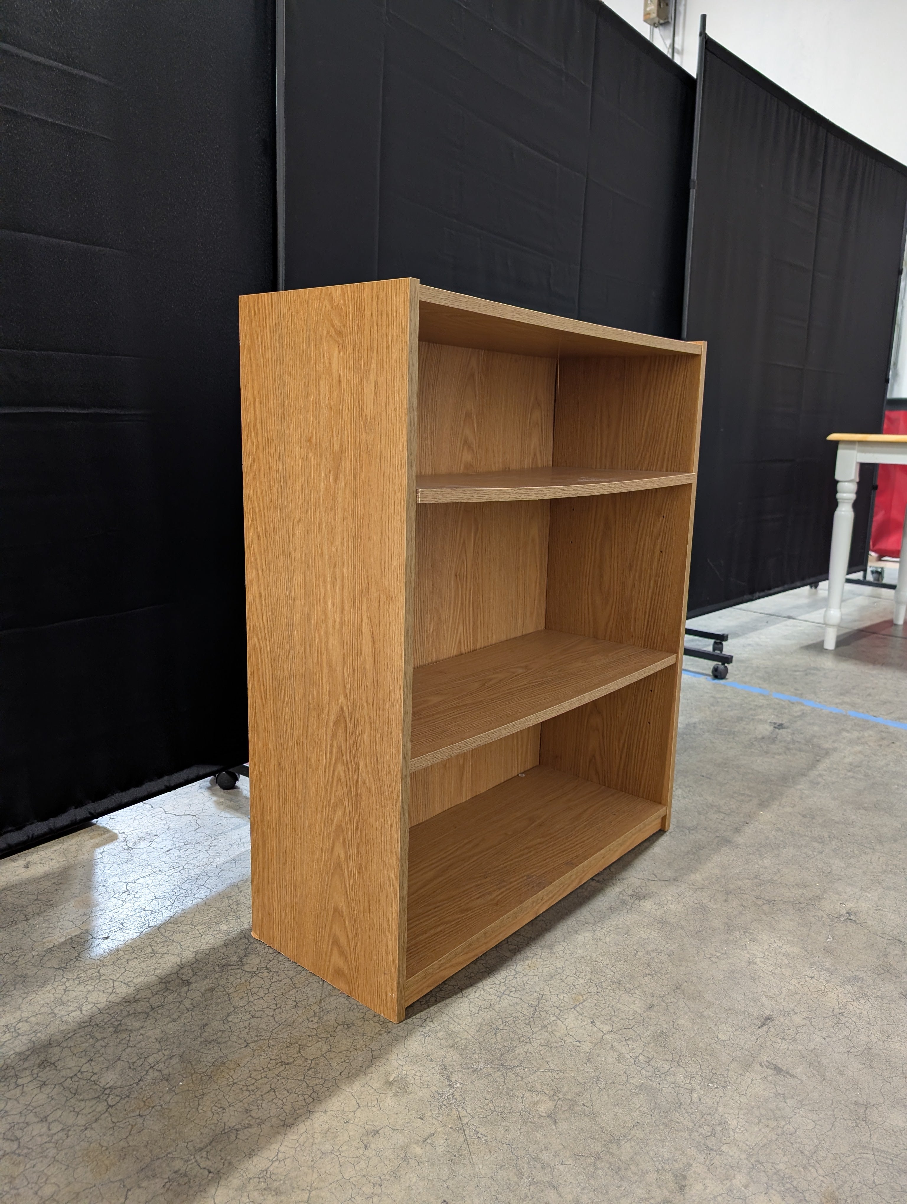 Versatile Light Brown Wood Grain Bookcase Shelving Unit