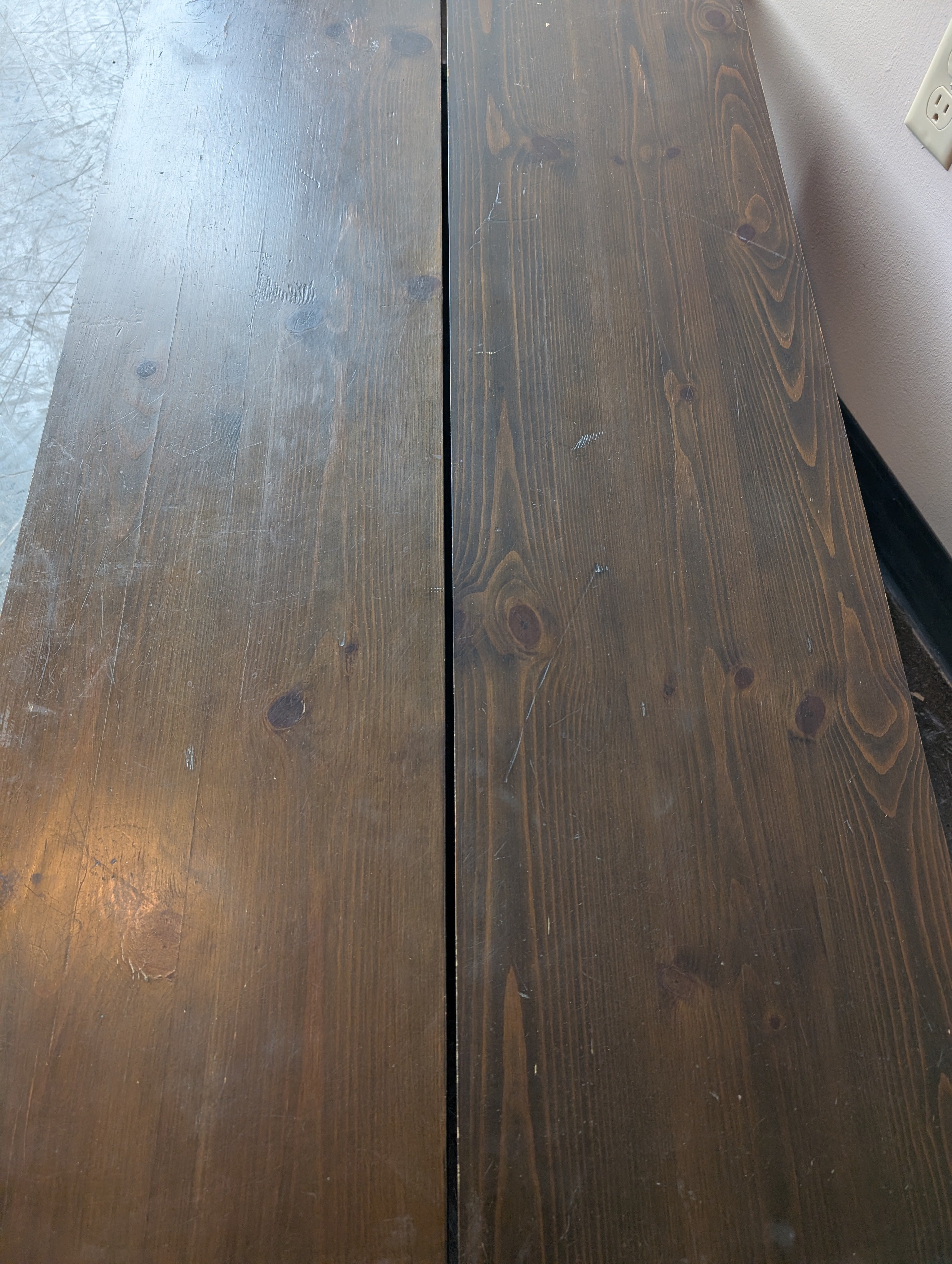 Two Dark Brown Stained Wood Boards