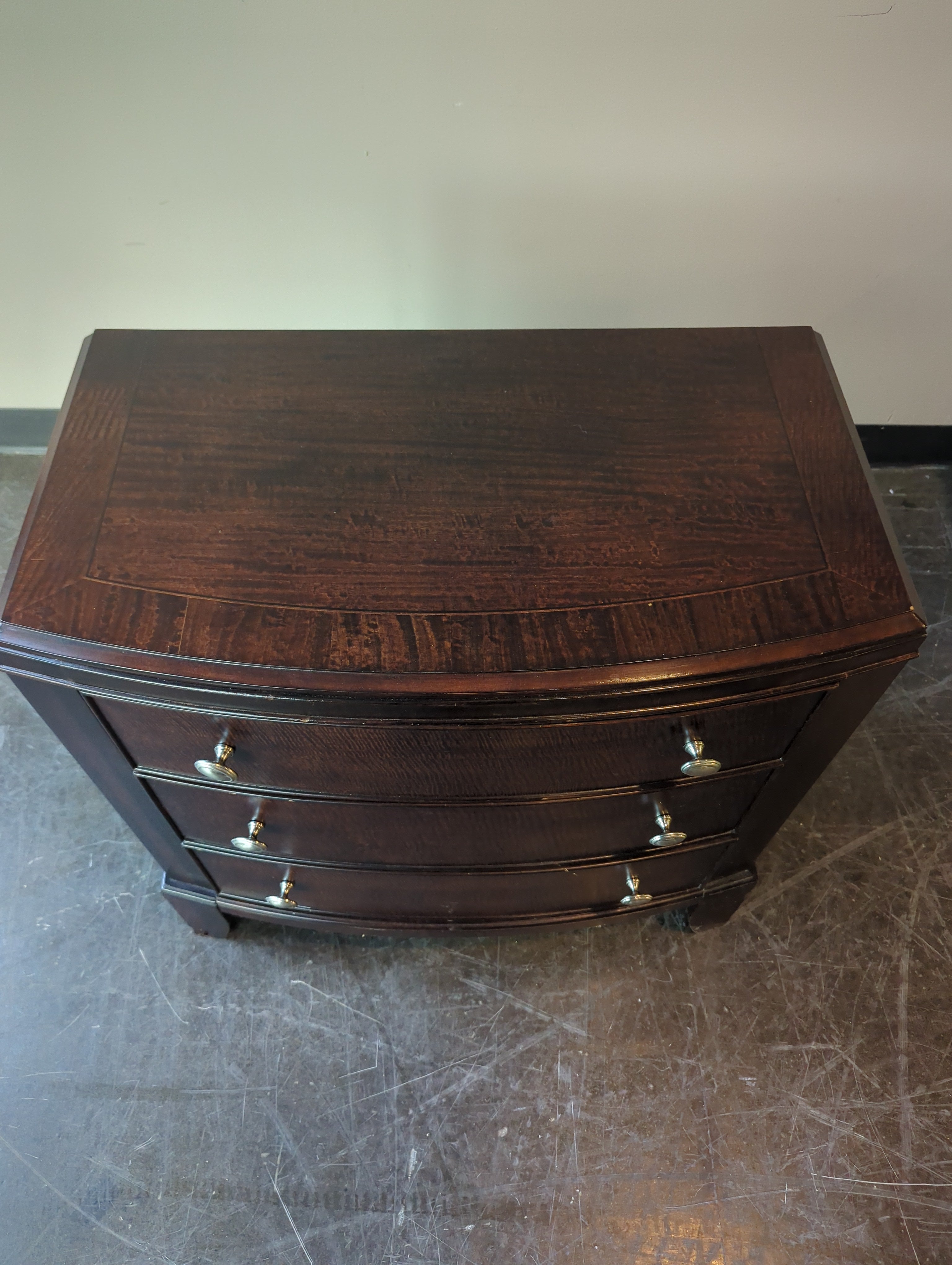 Dark Wood Nightstand with Three Drawers