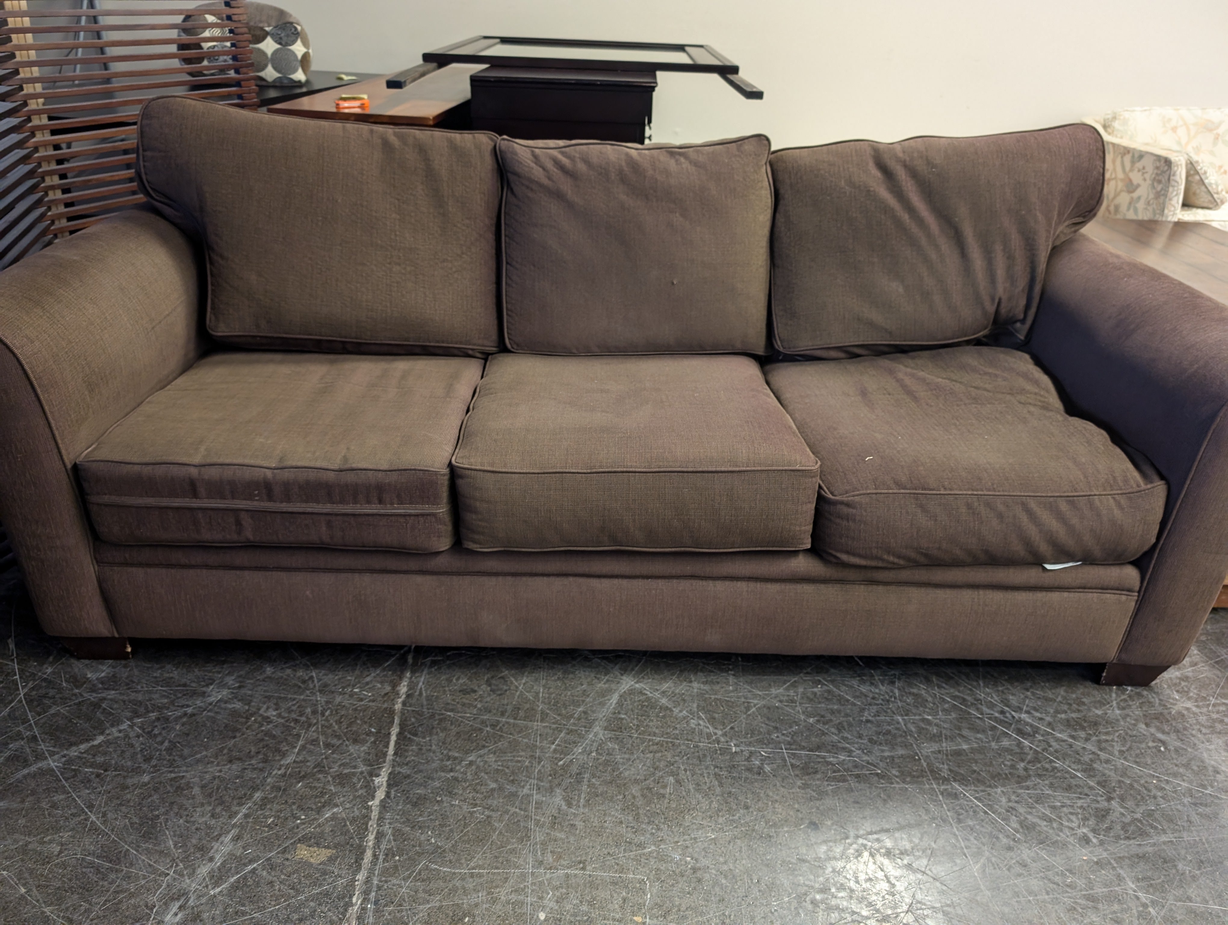 Comfortable Muted Brown Three-Seater Sofa