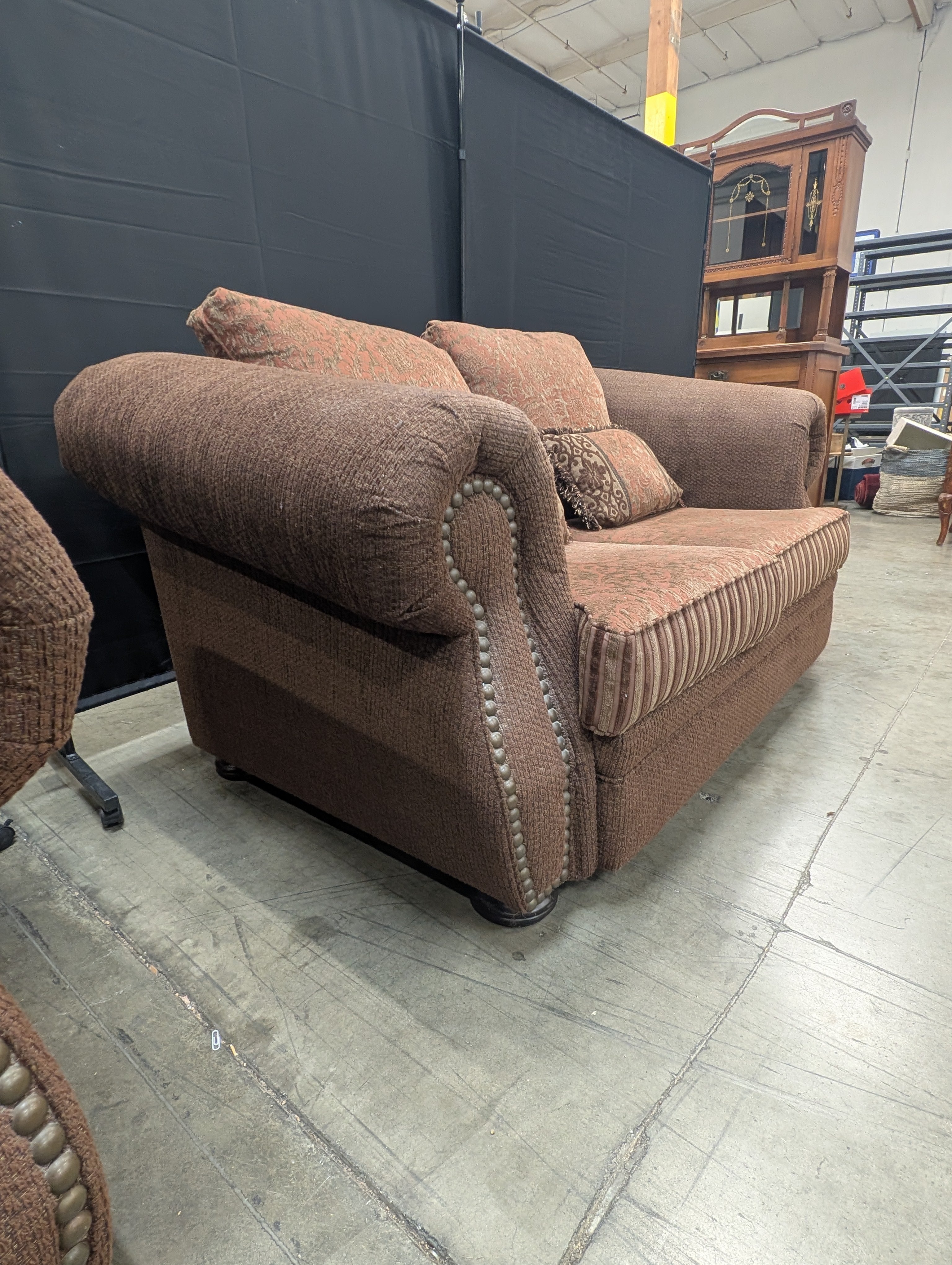 Textured Brown Loveseat with Nail Trim