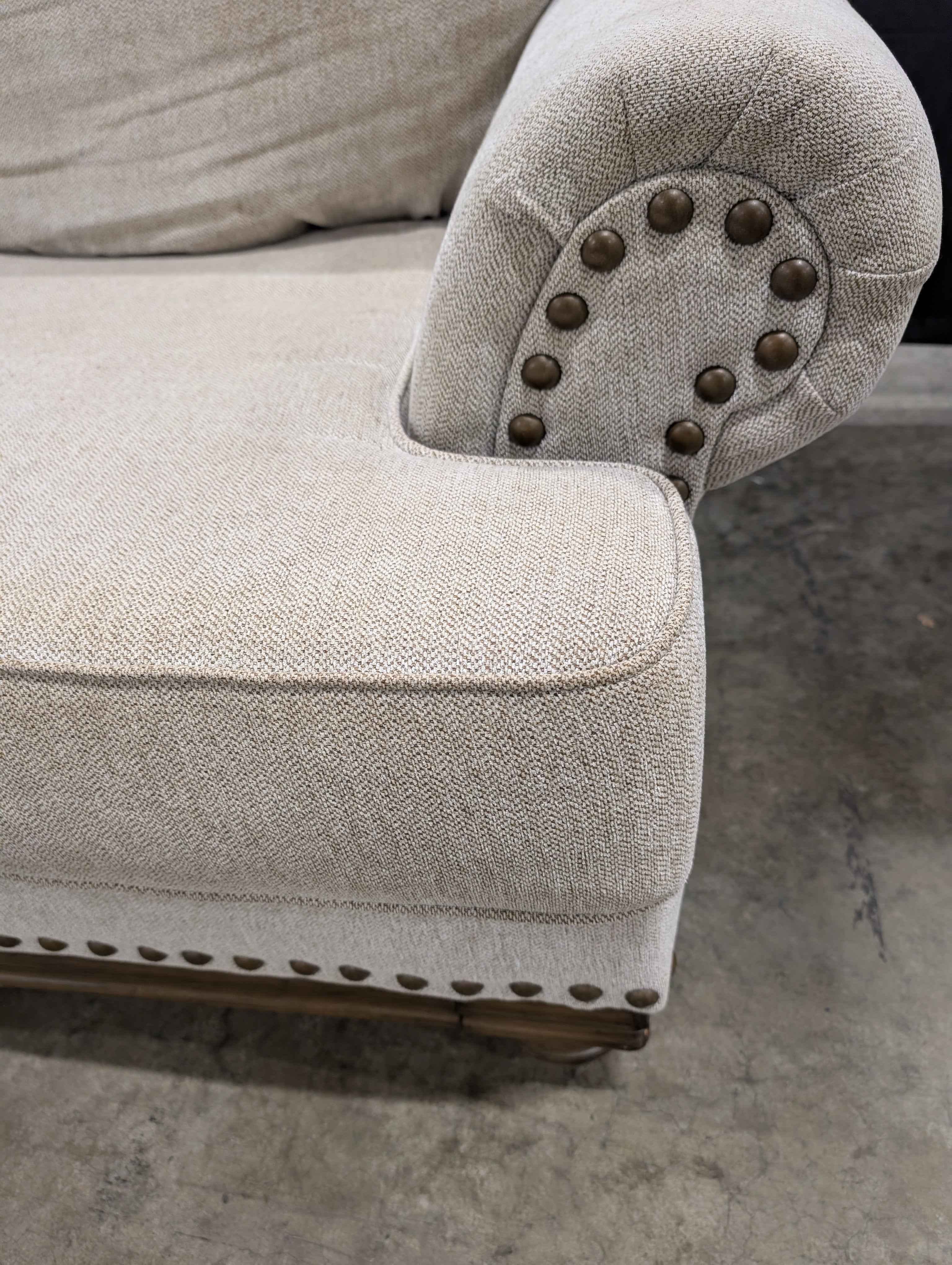 Neutral Three-Cushion Nail Trim Sofa