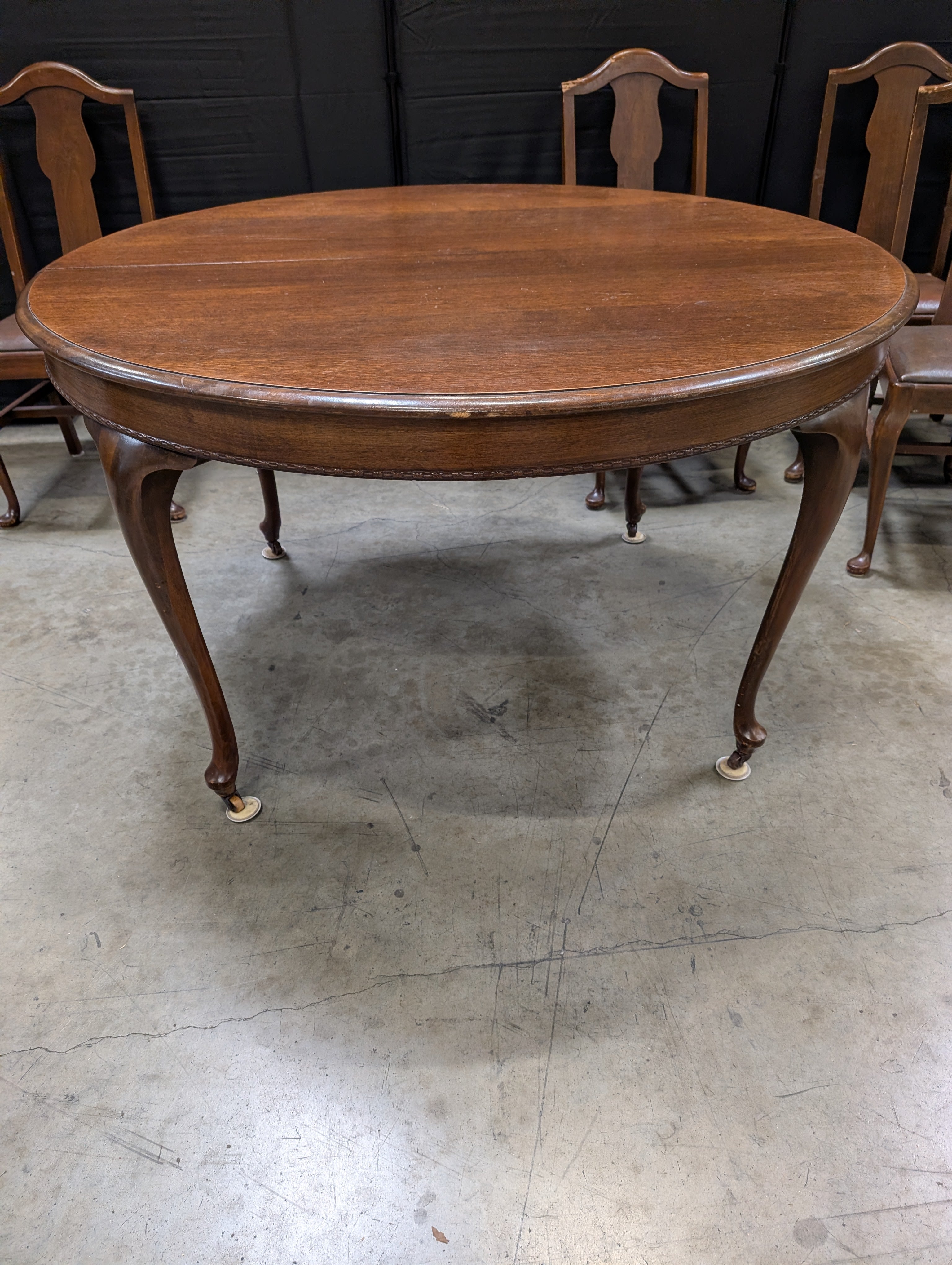 Antique Dark Wood Round Dining Table with six Dining Chairs