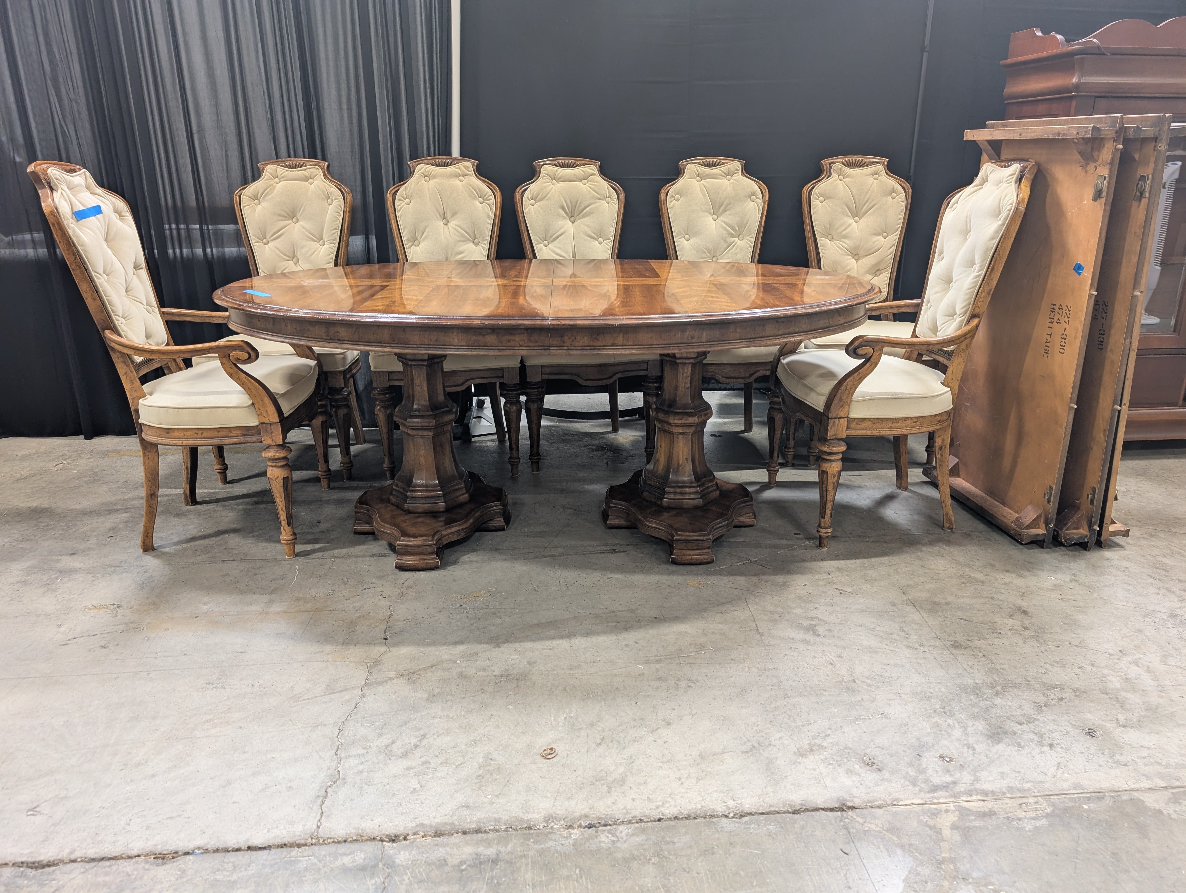 Traditional Carved Wood Dining Table with Eight Upholstered Chairs and Three Leafs