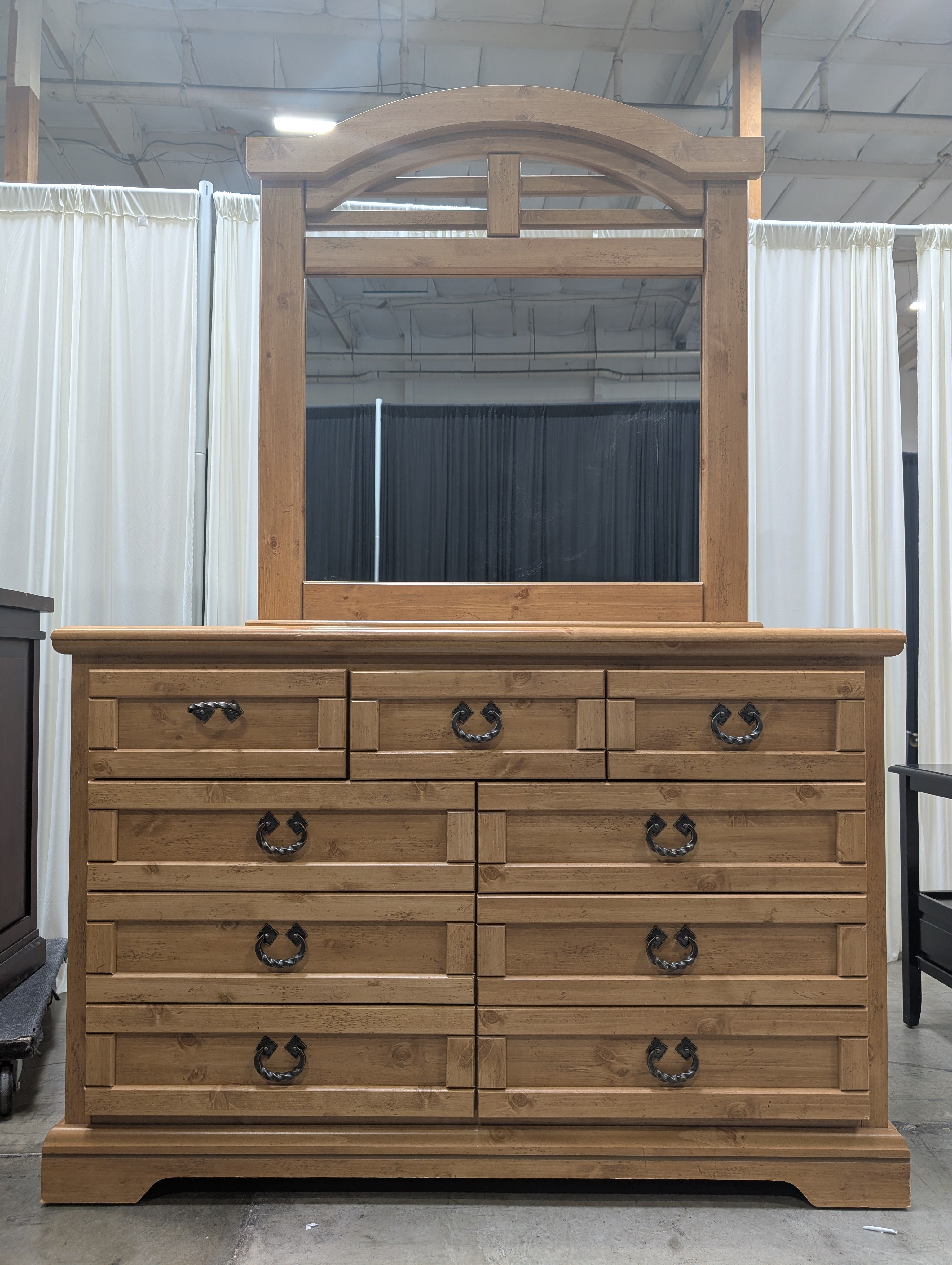 Rustic Light Wood 8-Drawer Dresser with Arched Mirror