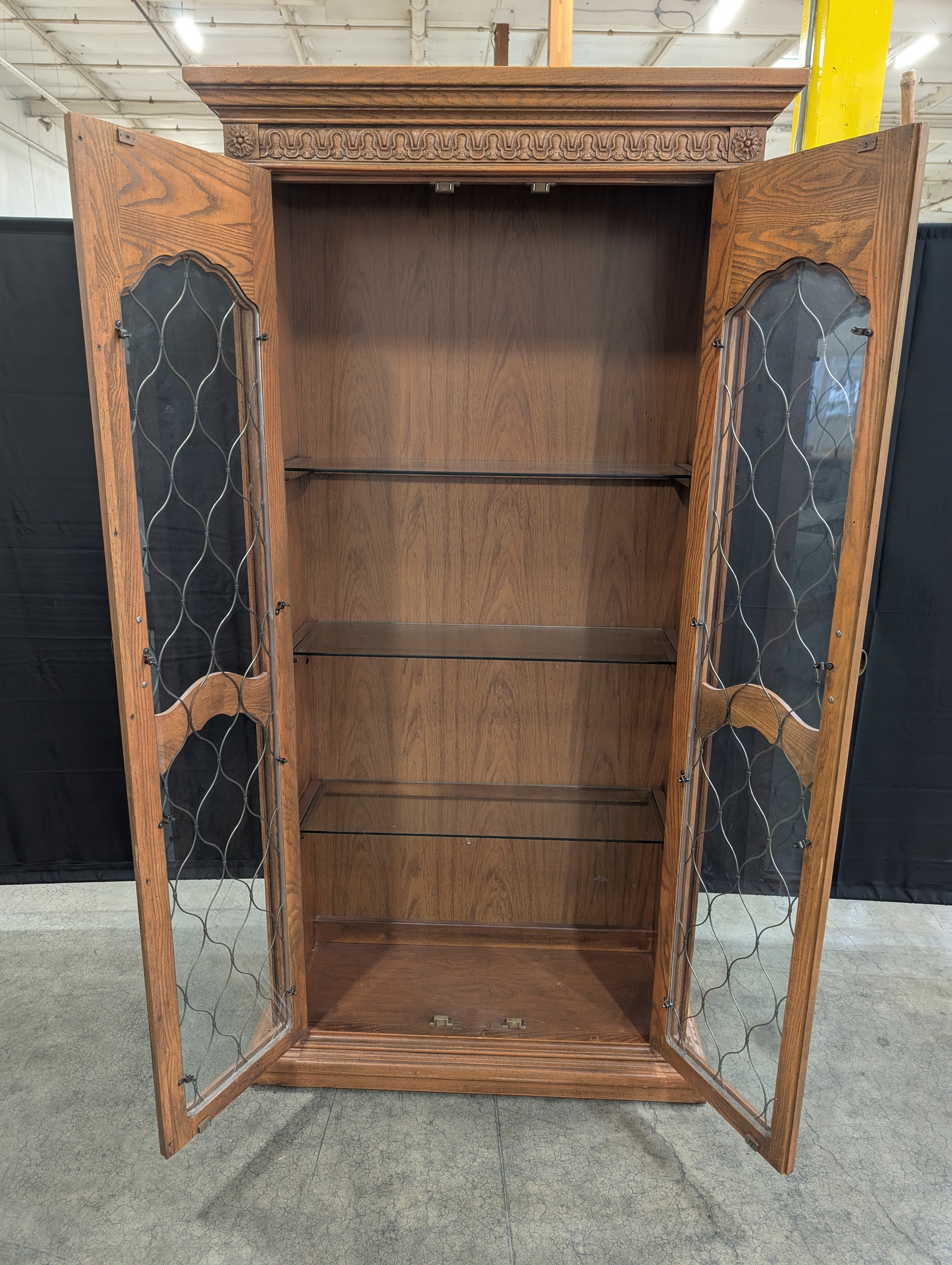 Ornate Wood Display Cabinet with Leaded Glass Doors