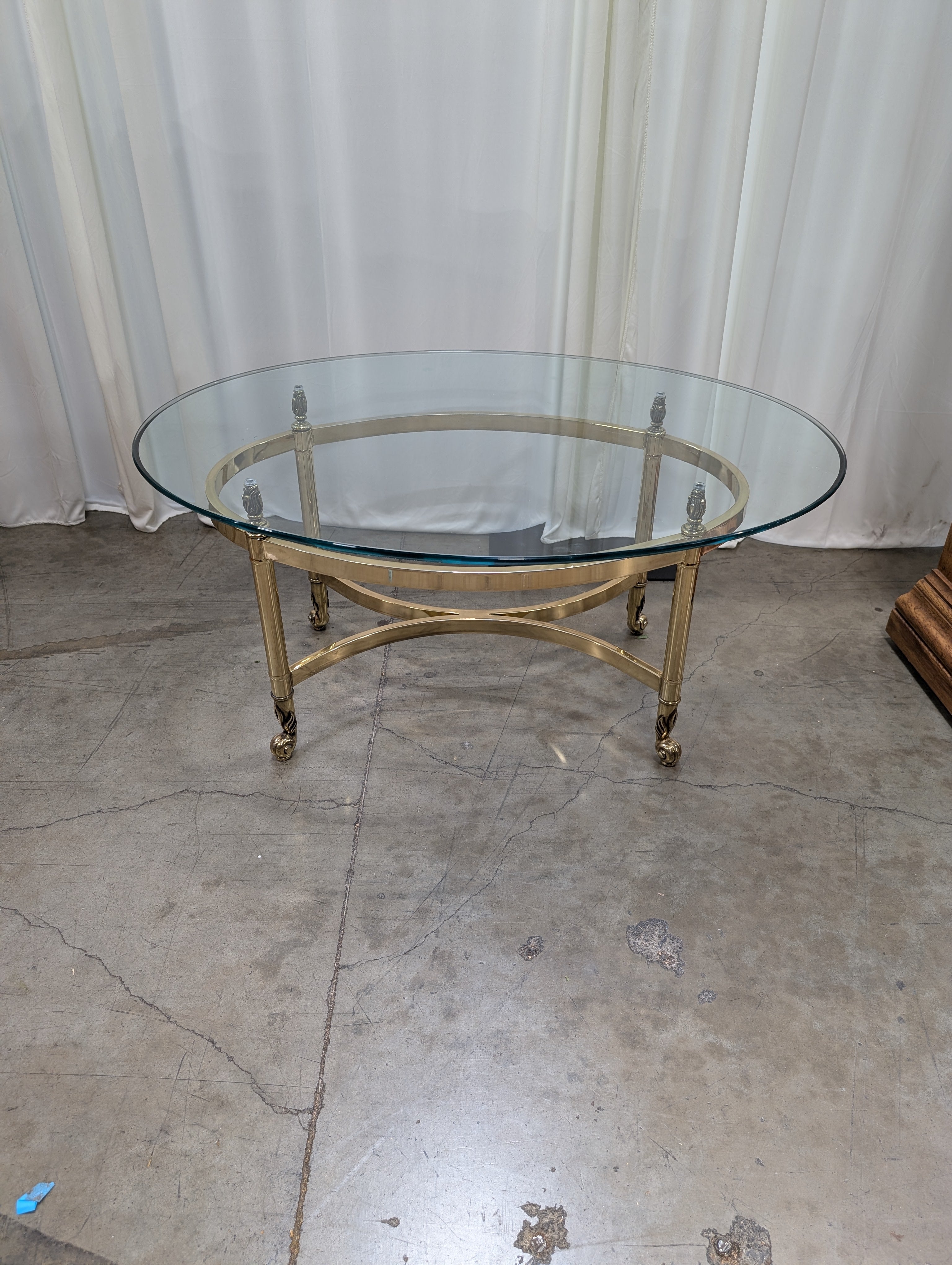 Oval Glass Top Coffee Table with Casters