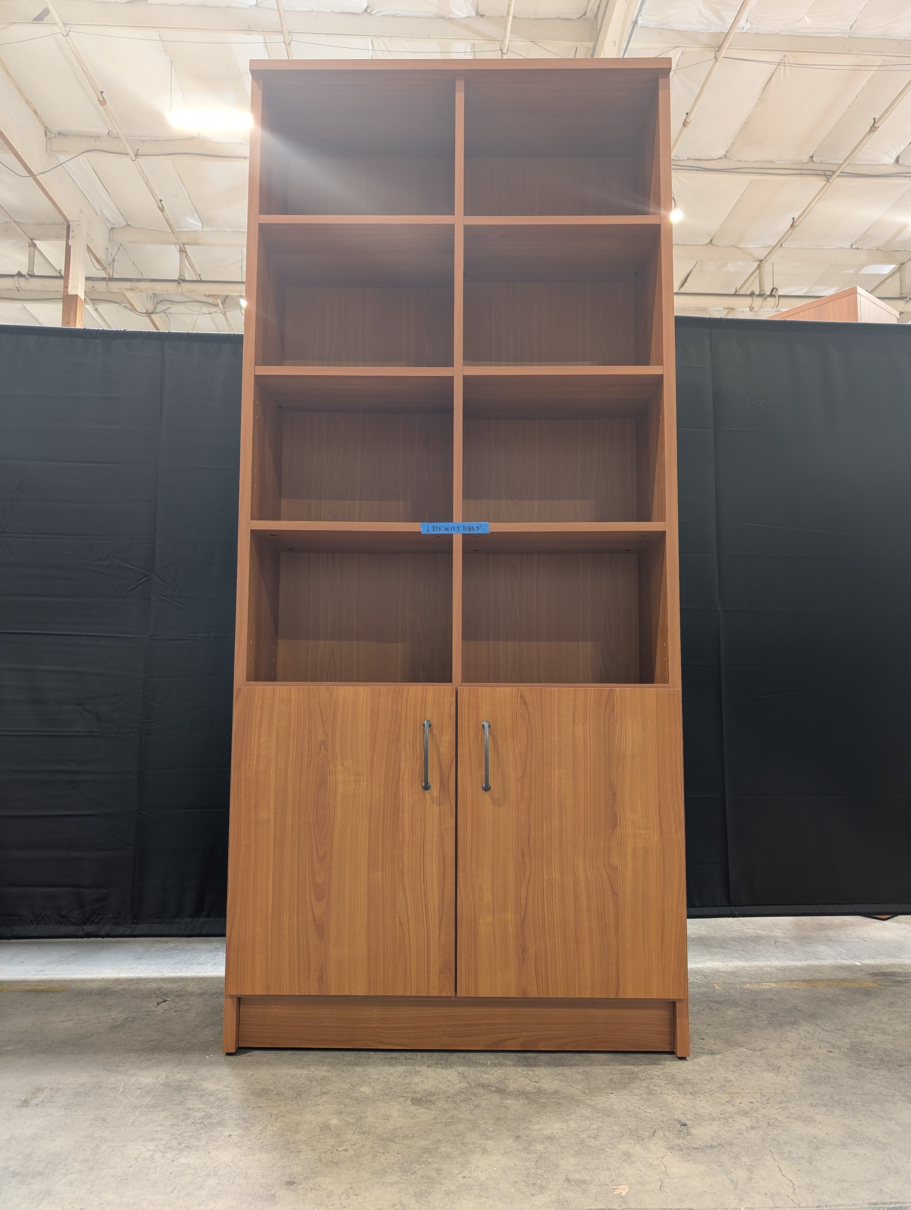 Cherry Wood Tone Multi-Section Bookcase with Lower Cabinet