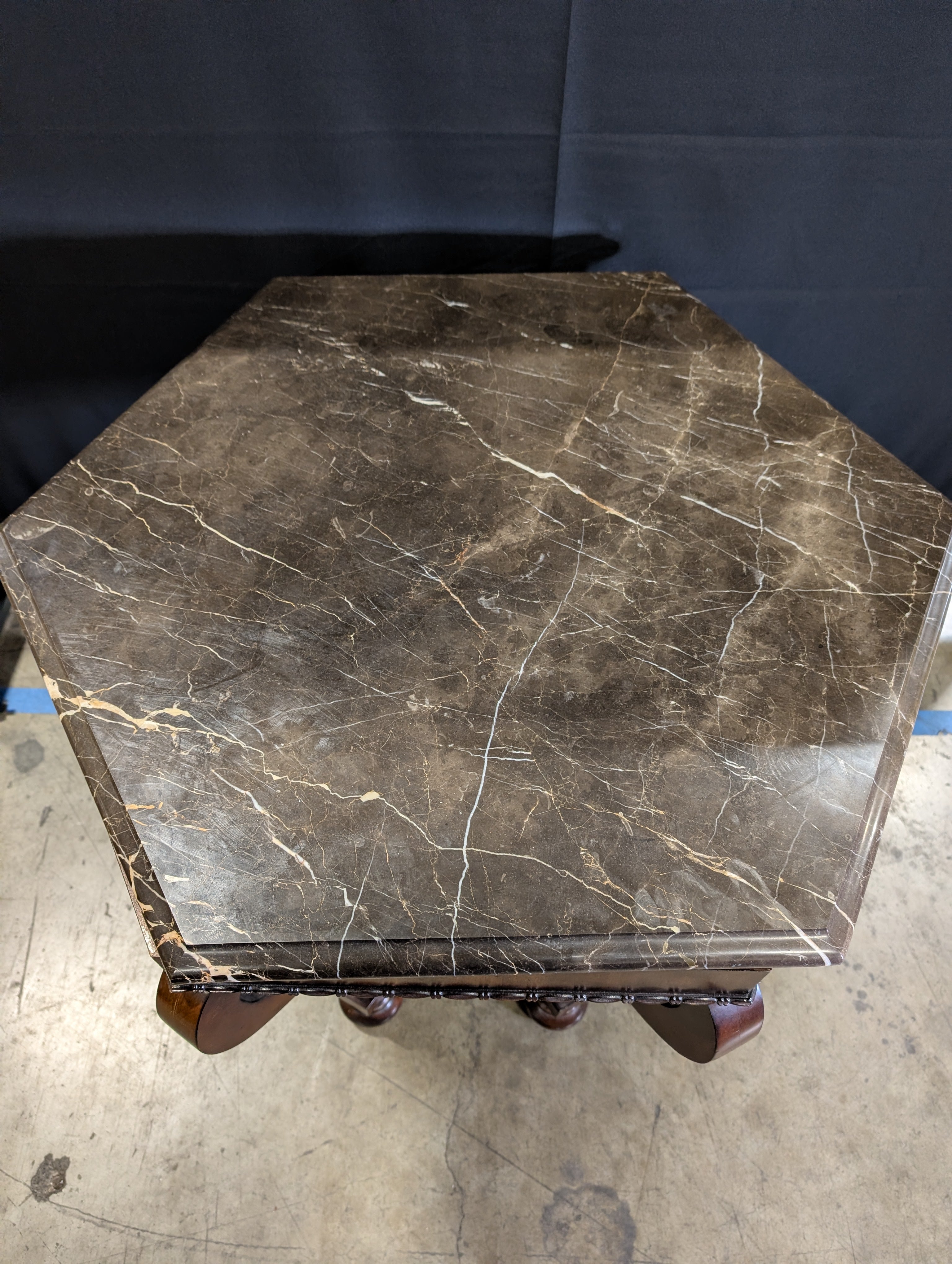 Hexagonal Dark Marble Top Accent Table with Carved Wood Pedestal Base