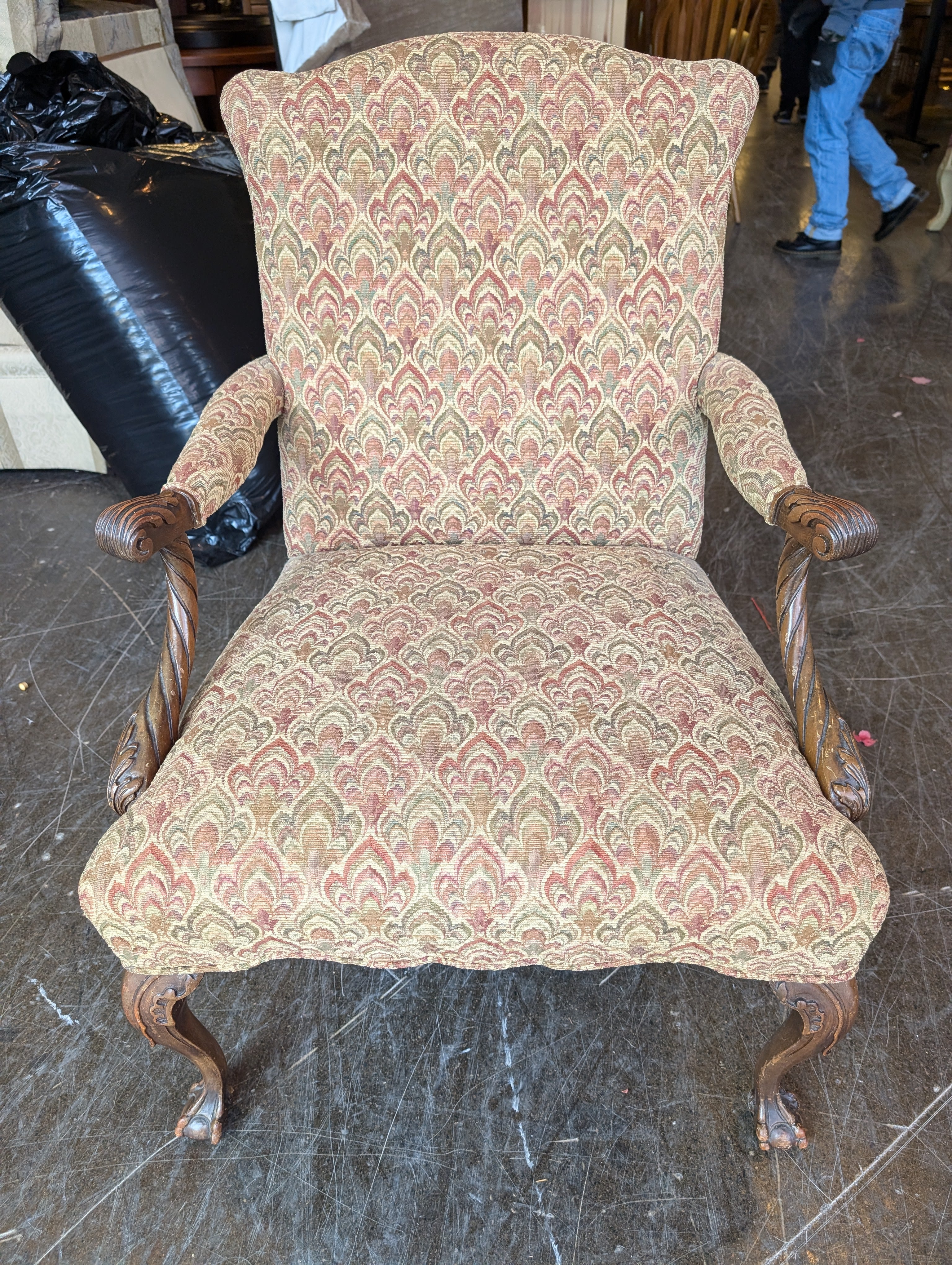 Traditional Upholstered Armchair with Carved Wood Accents