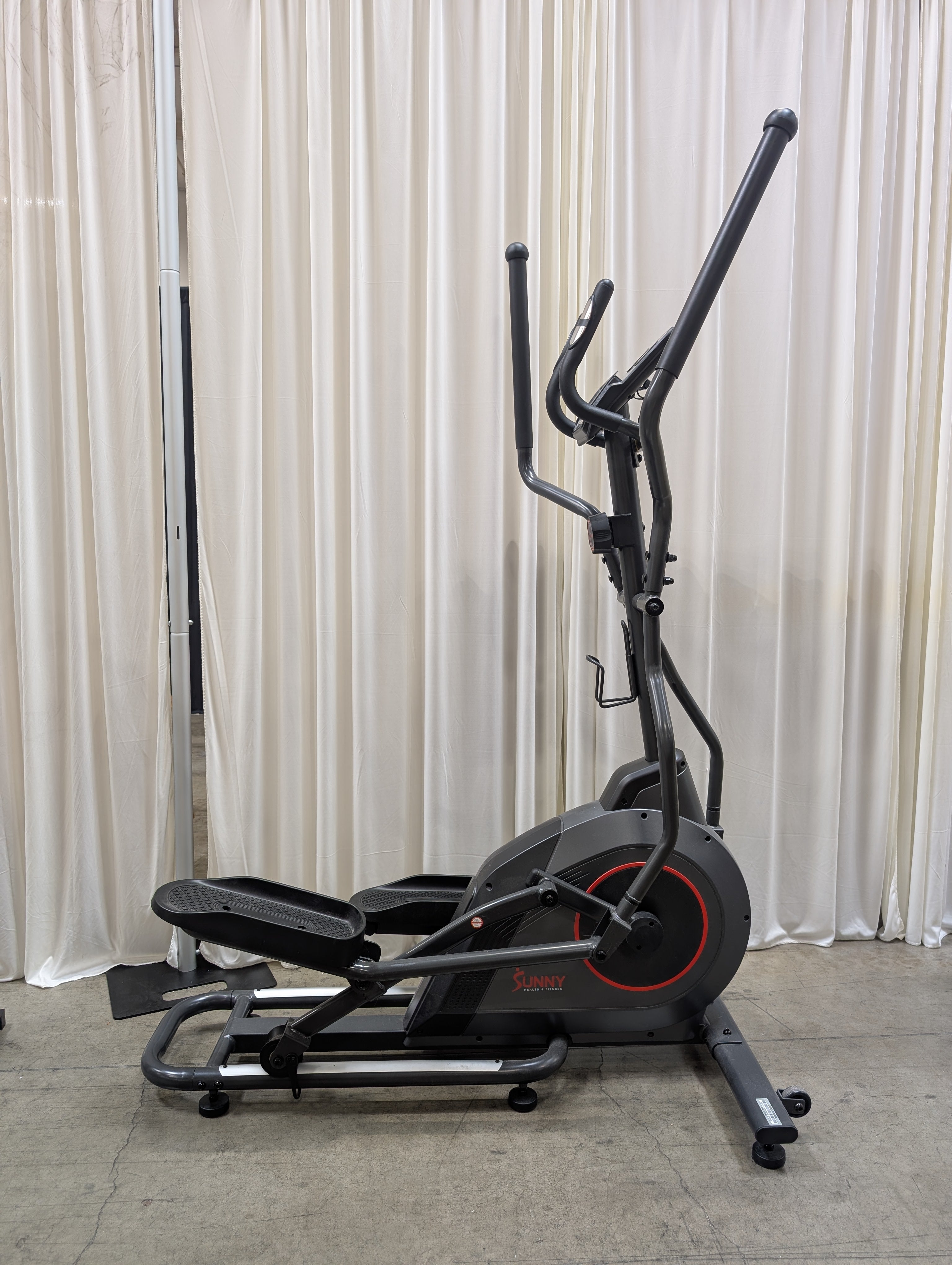 Black Magnetic Elliptical Trainer with Red Accents