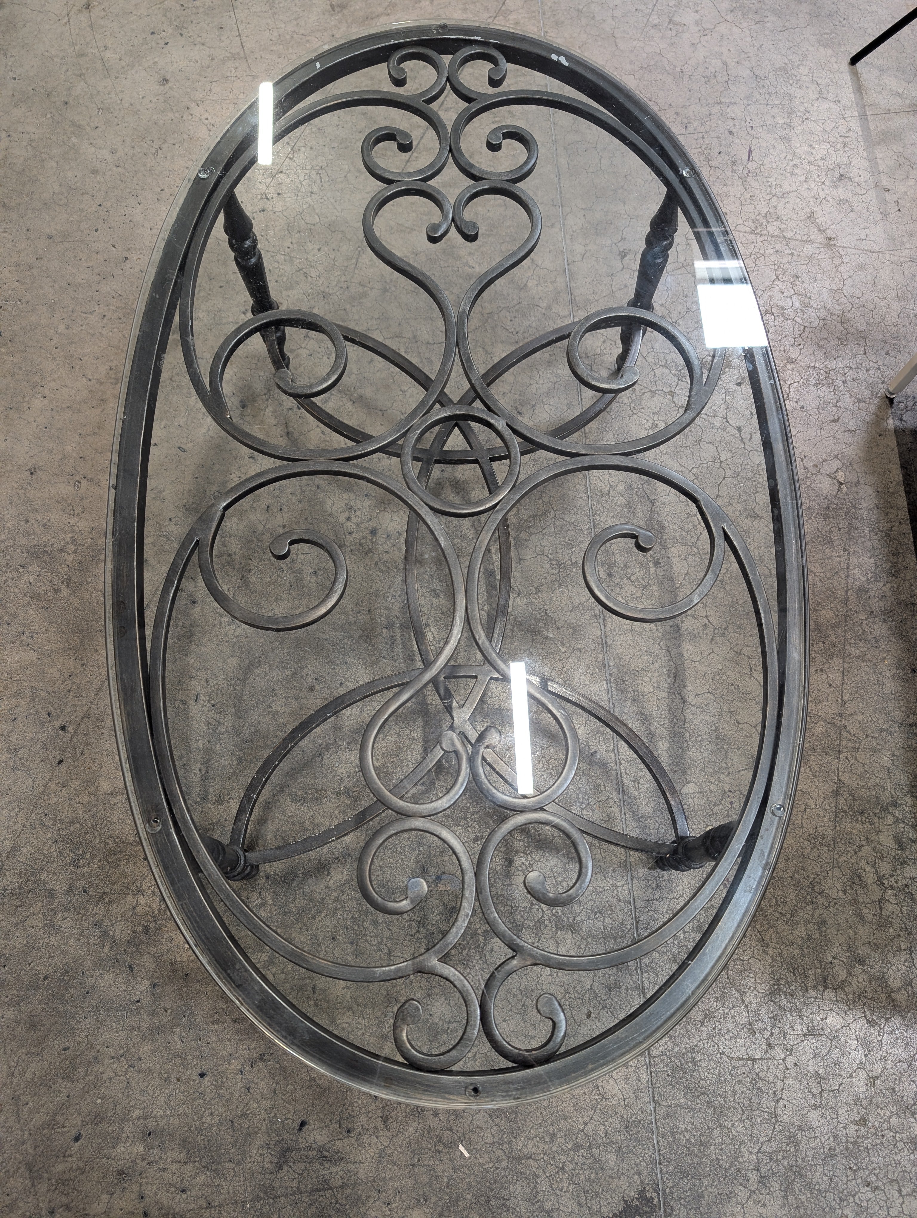 Ornate Scrollwork Metal and Glass Oval Coffee Table