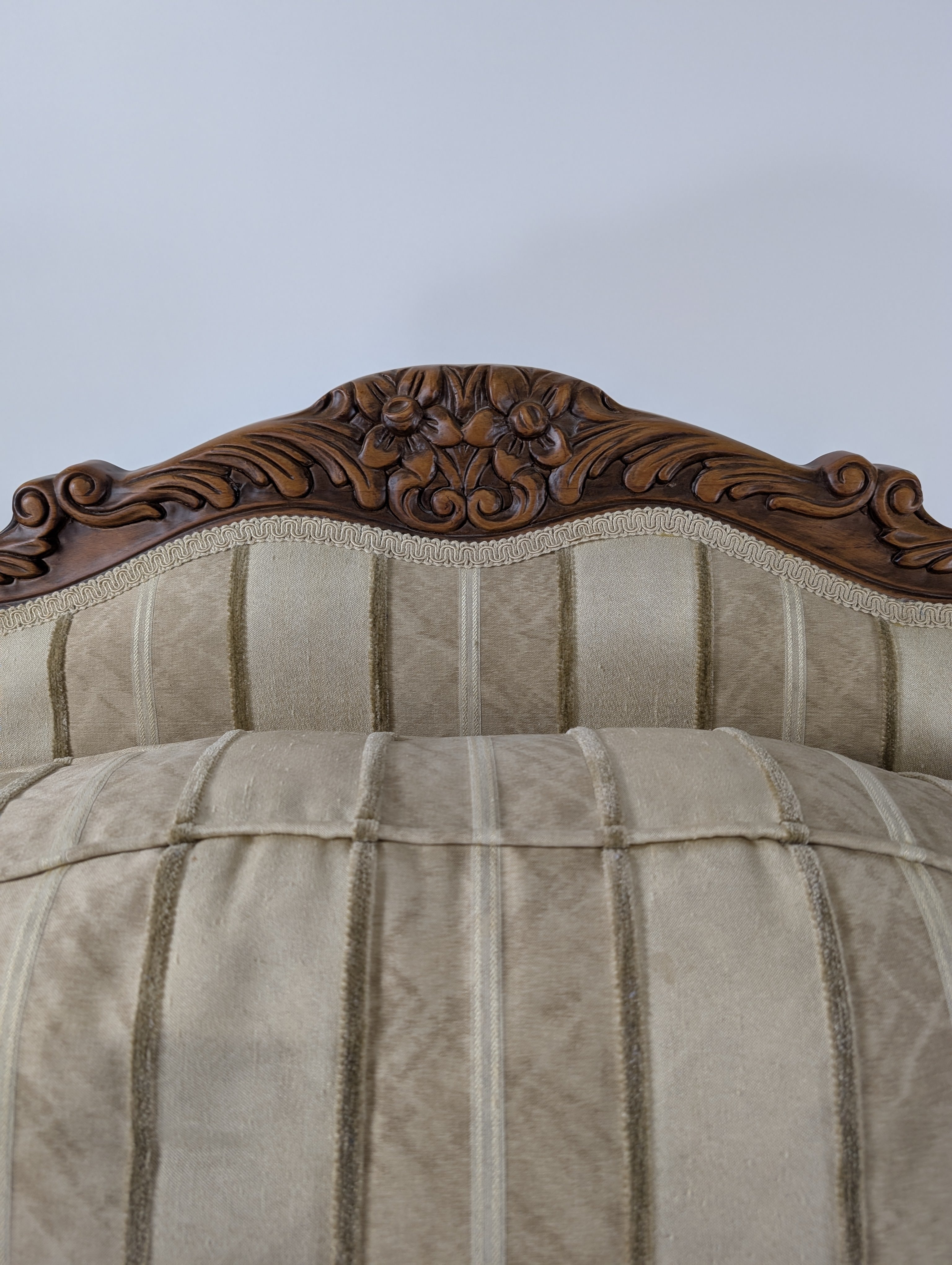 Ornate Carved Wood Armchair with Striped Upholstery