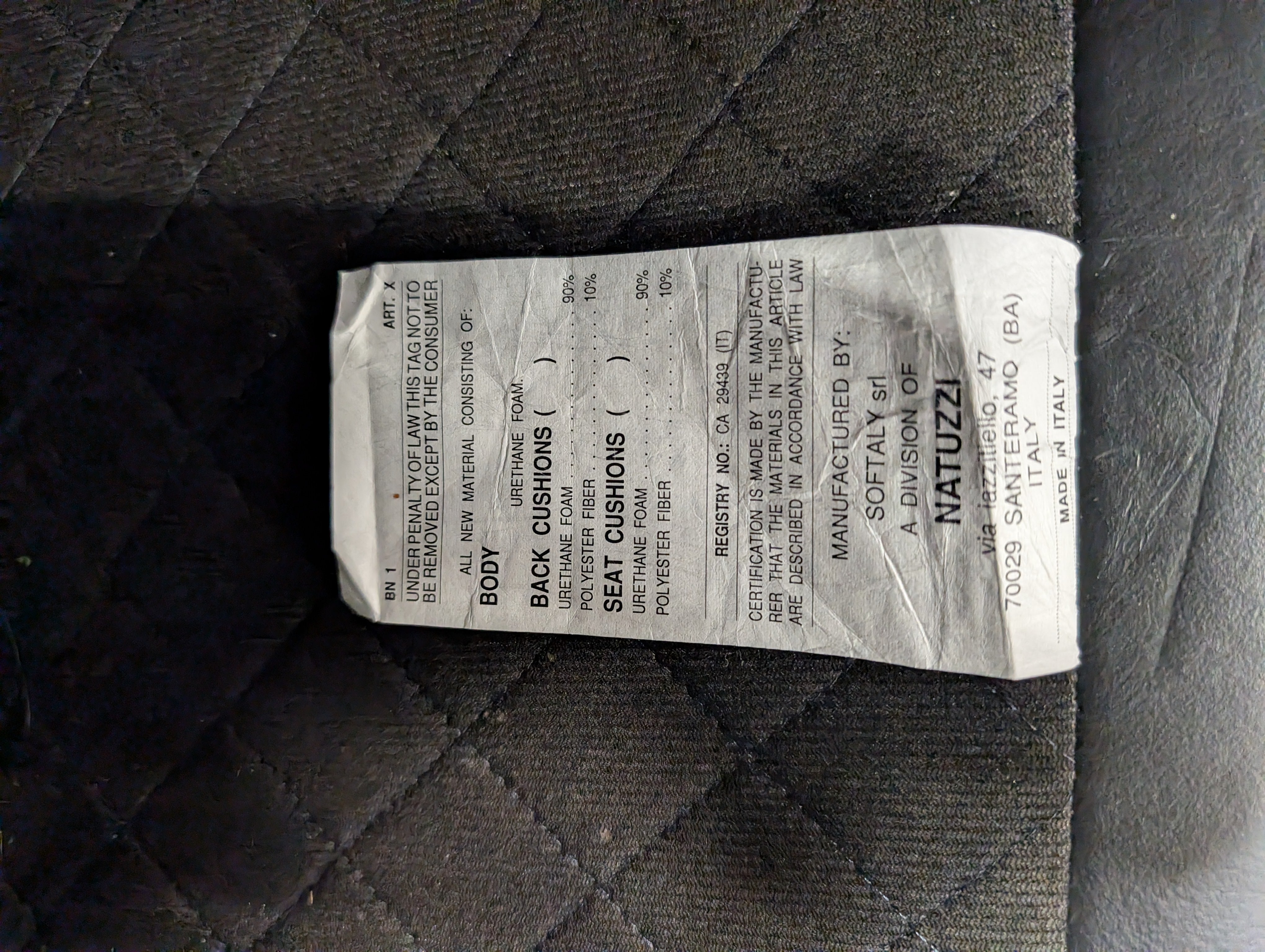 Natuzzi Spacious Black Leather Three-Seater Sofa with Ottoman