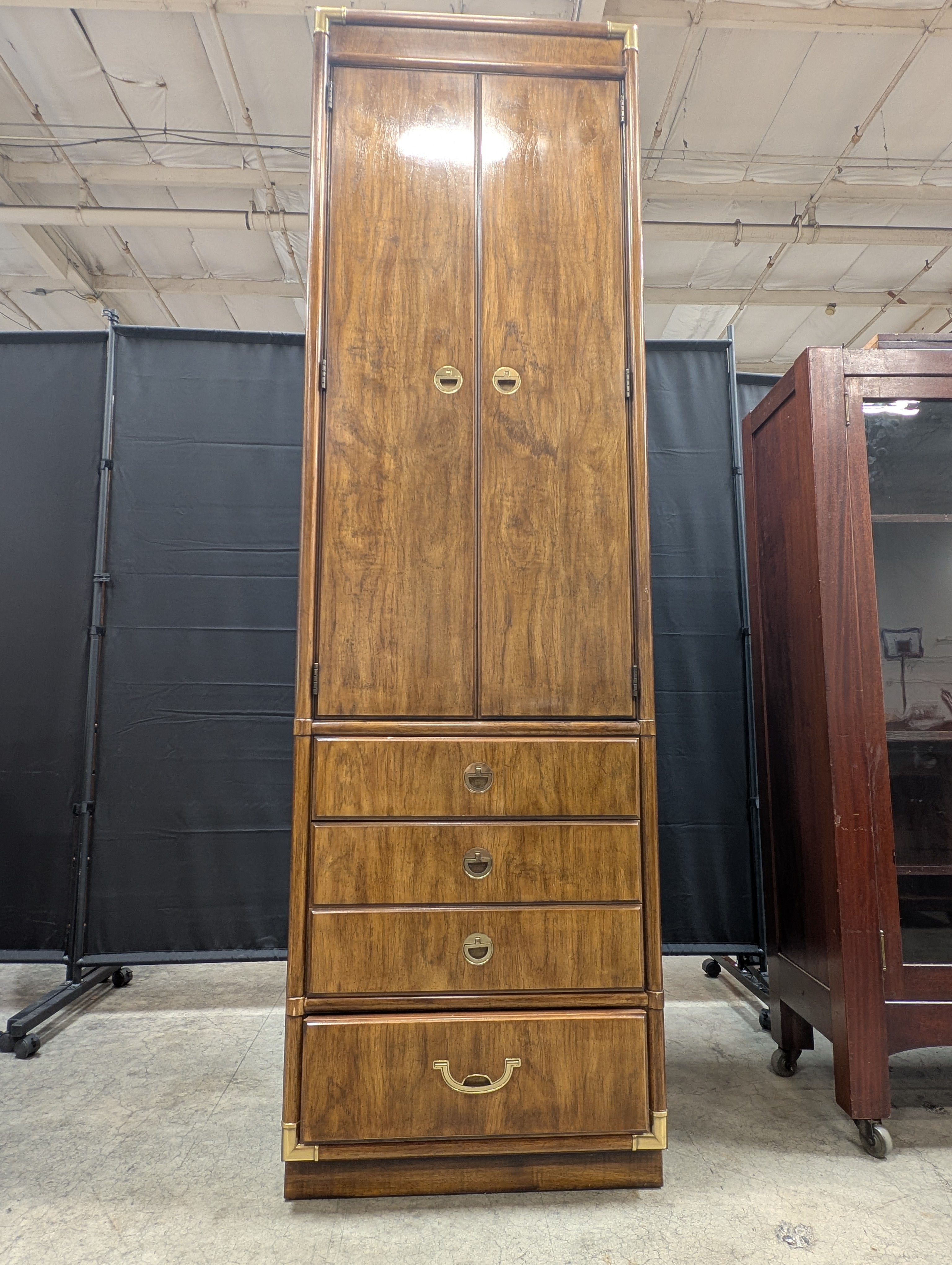 Tall Wooden Drexel Cabinet with Brass Accents and Multiple Drawers
