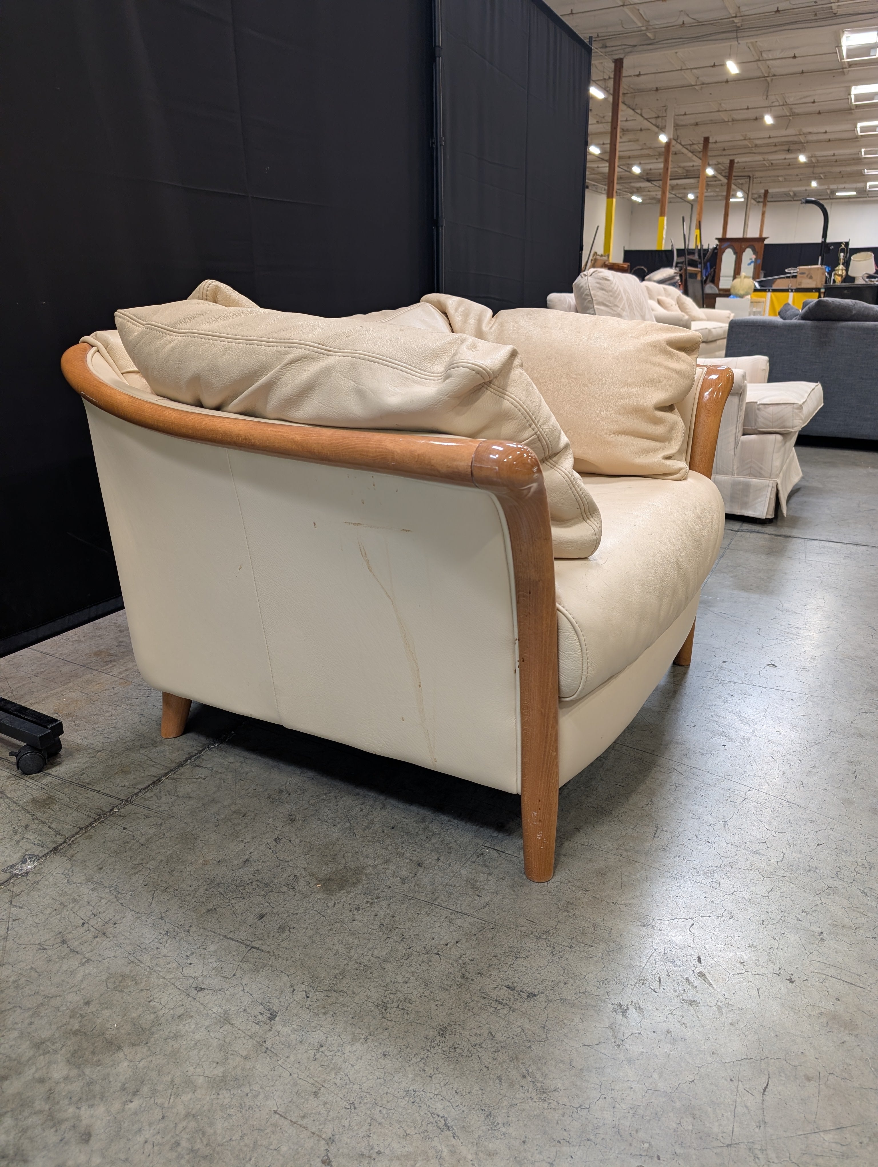 Beige leather Chair with Exposed Wood Frame