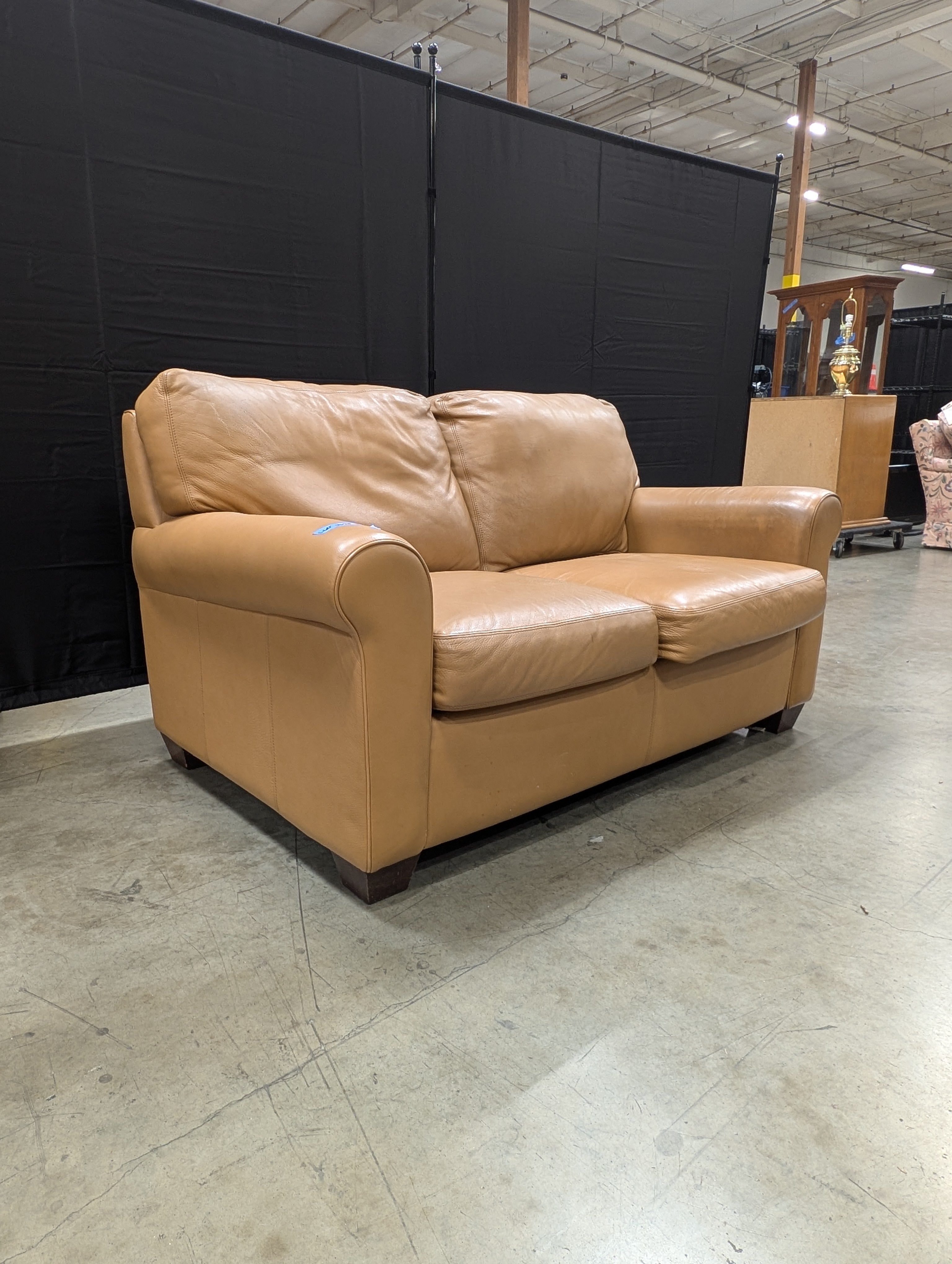 Compact Two-Seater Tan Leather Sofa