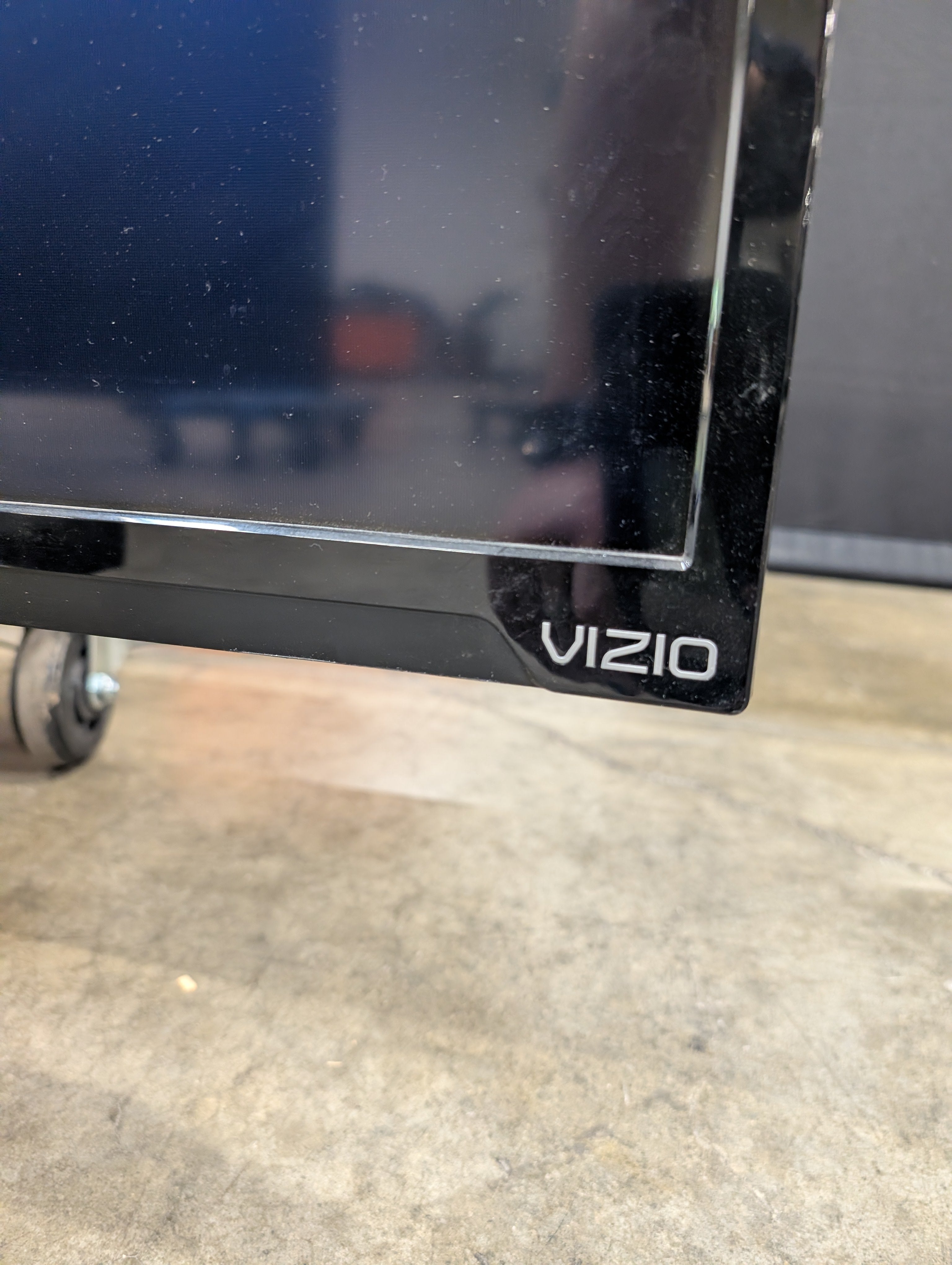 Black Flat Panel TV with Stand