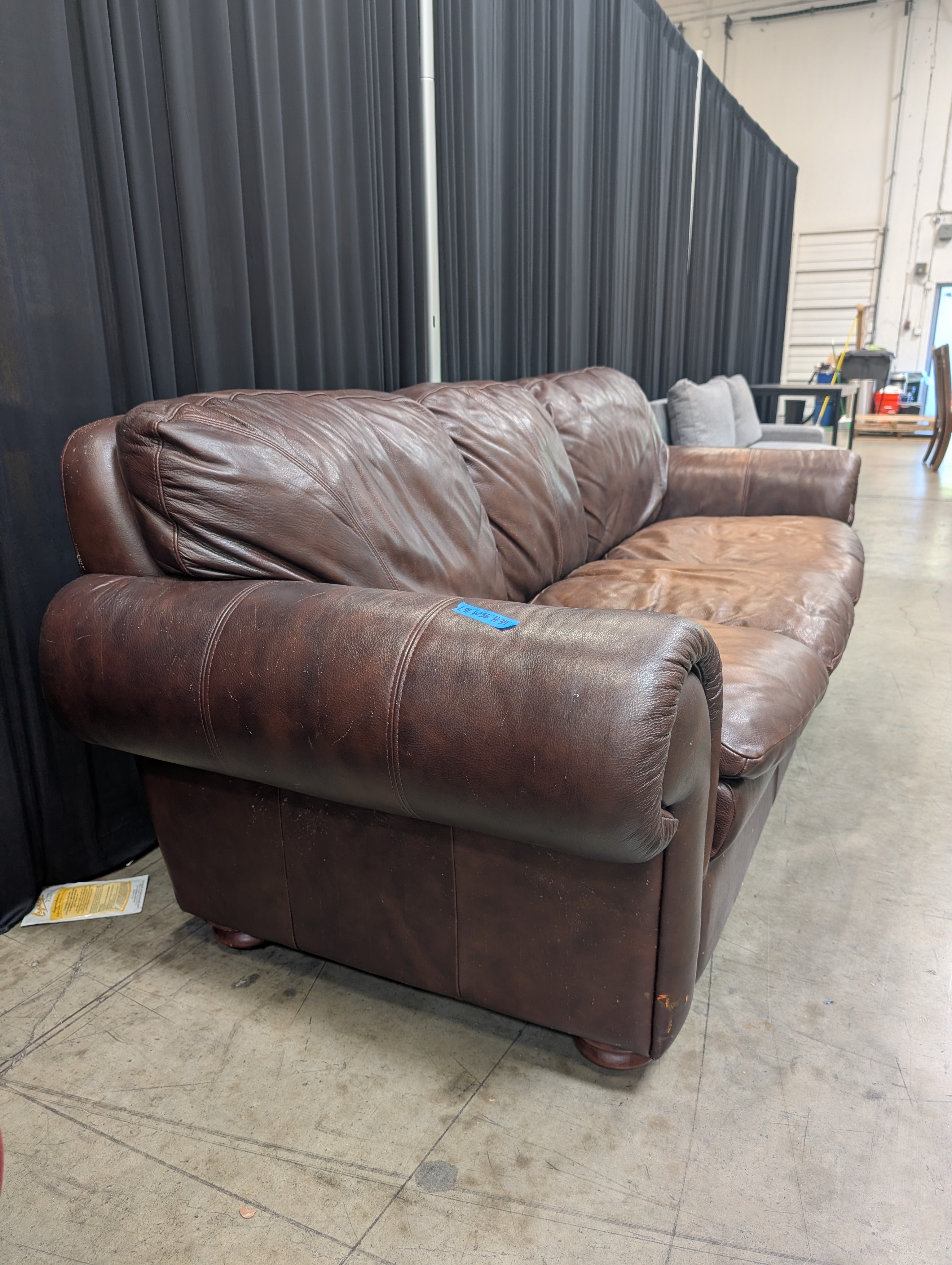 Brown Leather Three-Cushion Couch