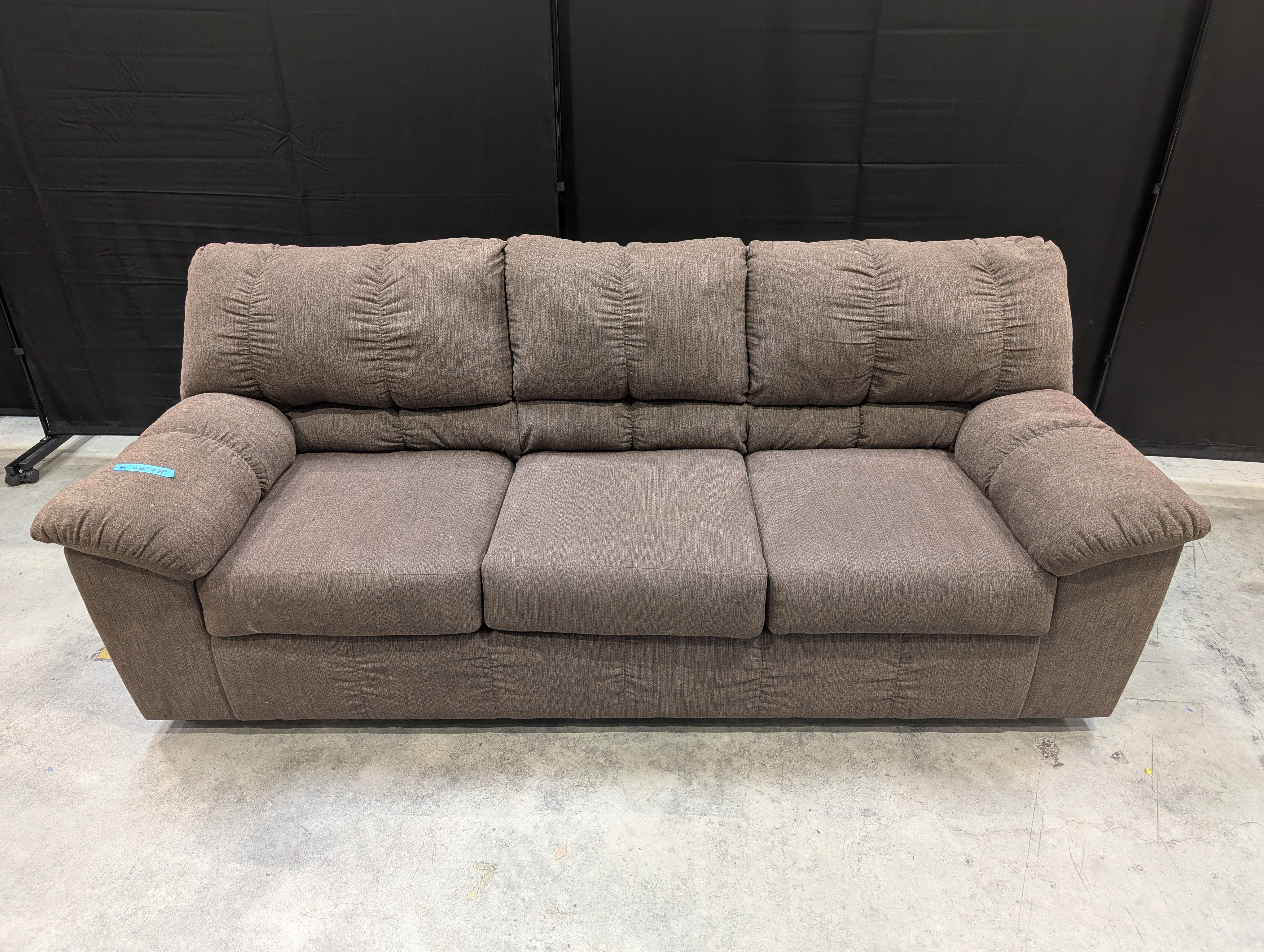 Brown Fabric Ashley Furniture Three-Seat Sofa