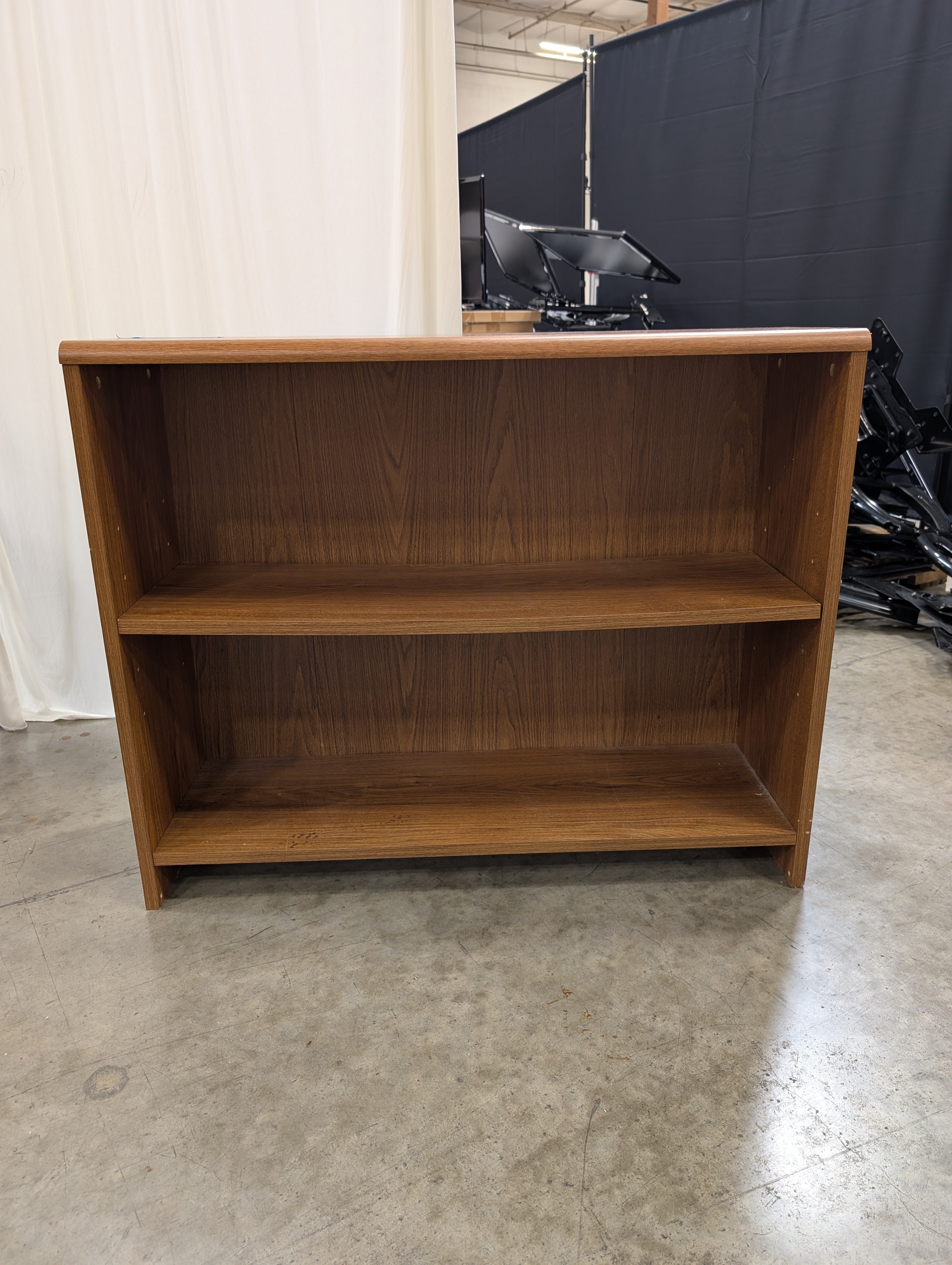 Compact Two-Shelf Wood-Toned Bookcase