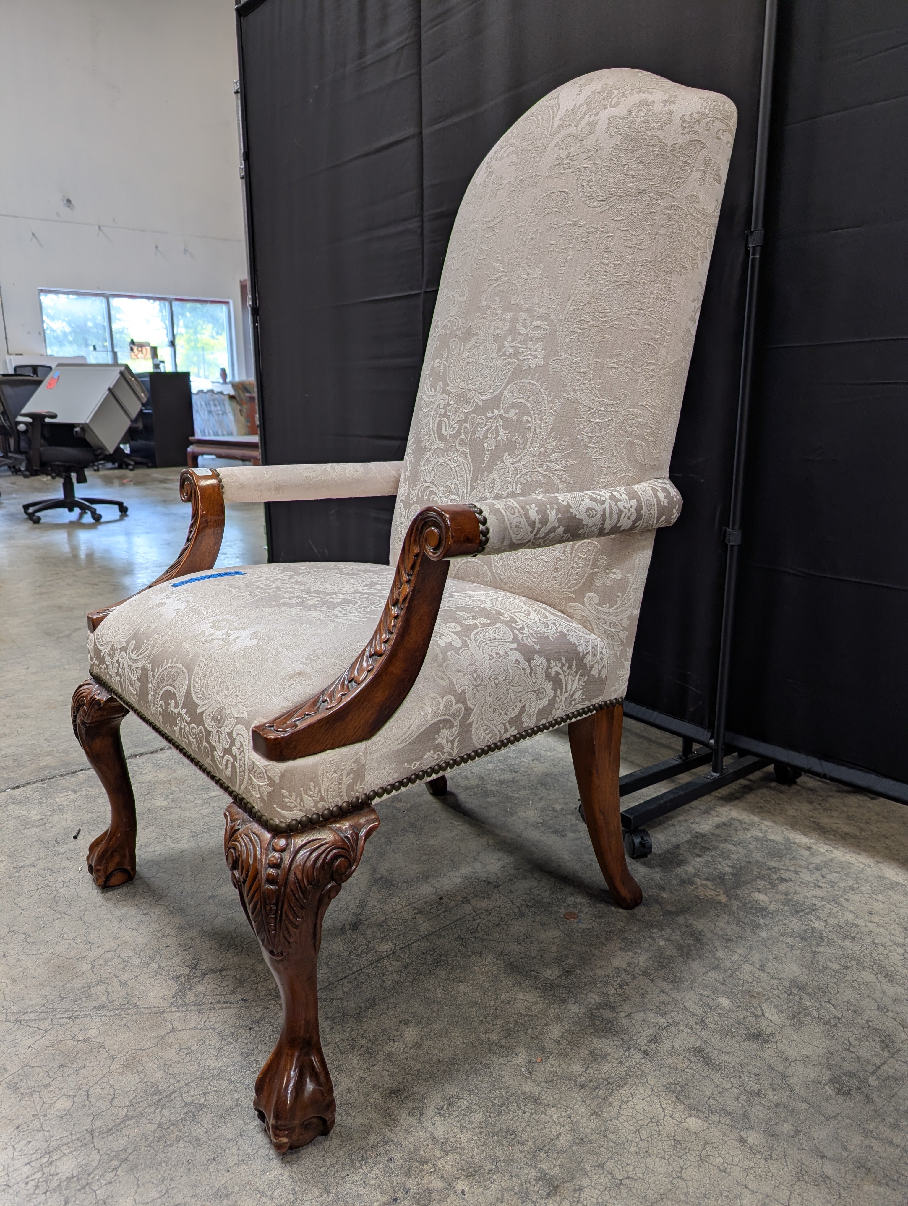Ornate Carved Wood High-Back Armchair with Damask Upholstery
