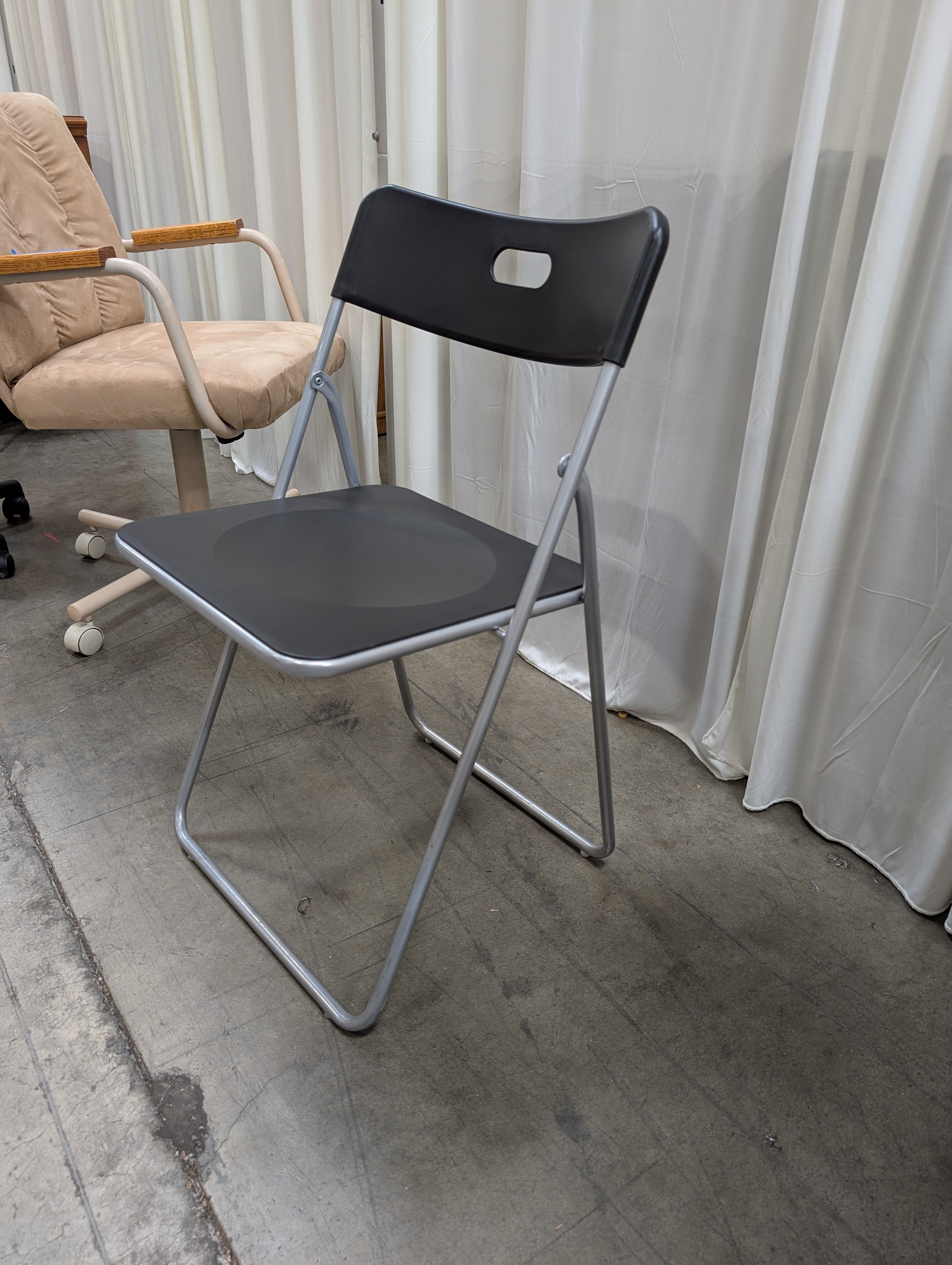 Black Metal Folding Chairs with Integrated Handles