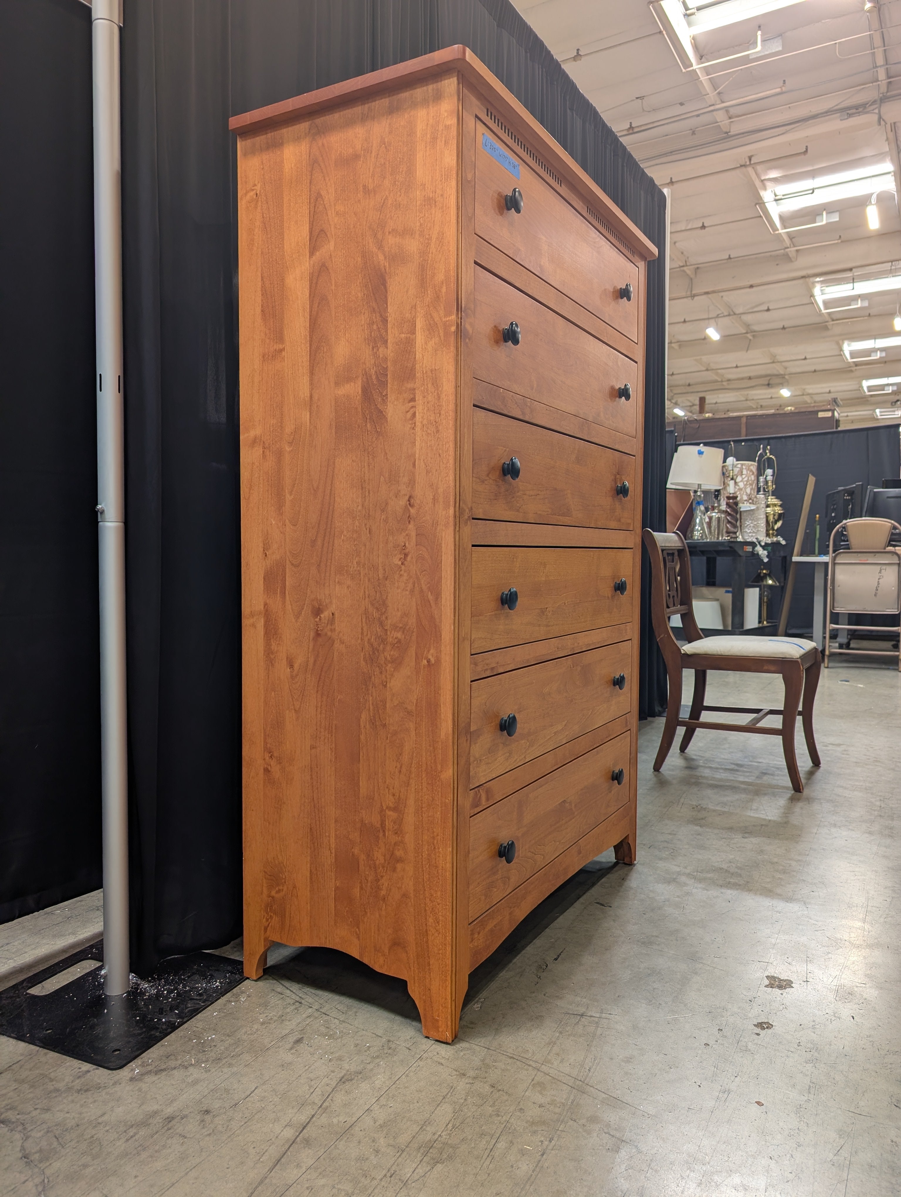 Warm Honey Wood Six-Drawer Dresser with Dark Knobs