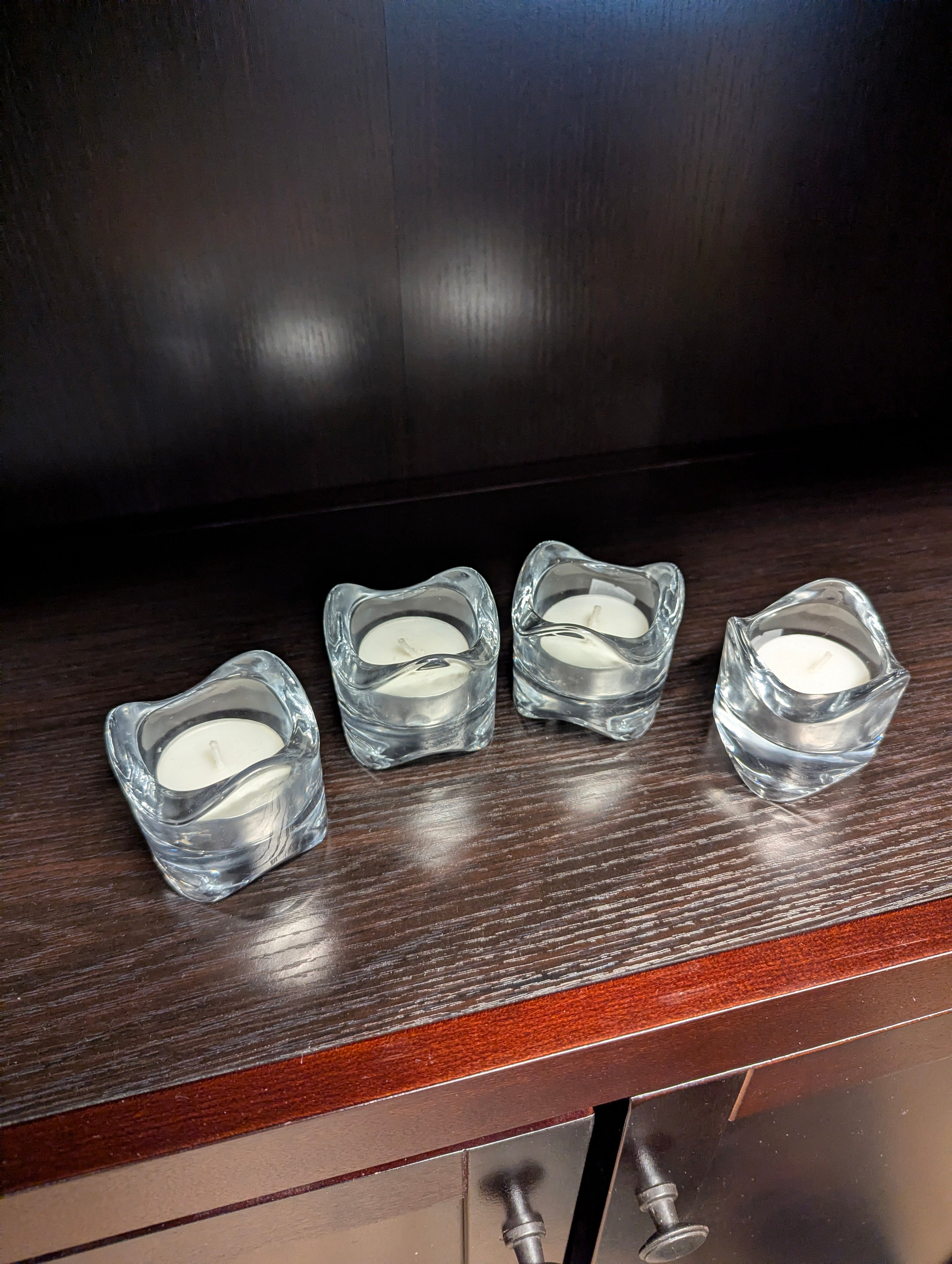 Set of Four Clear Glass Votive Candle Holders with Wavy Design