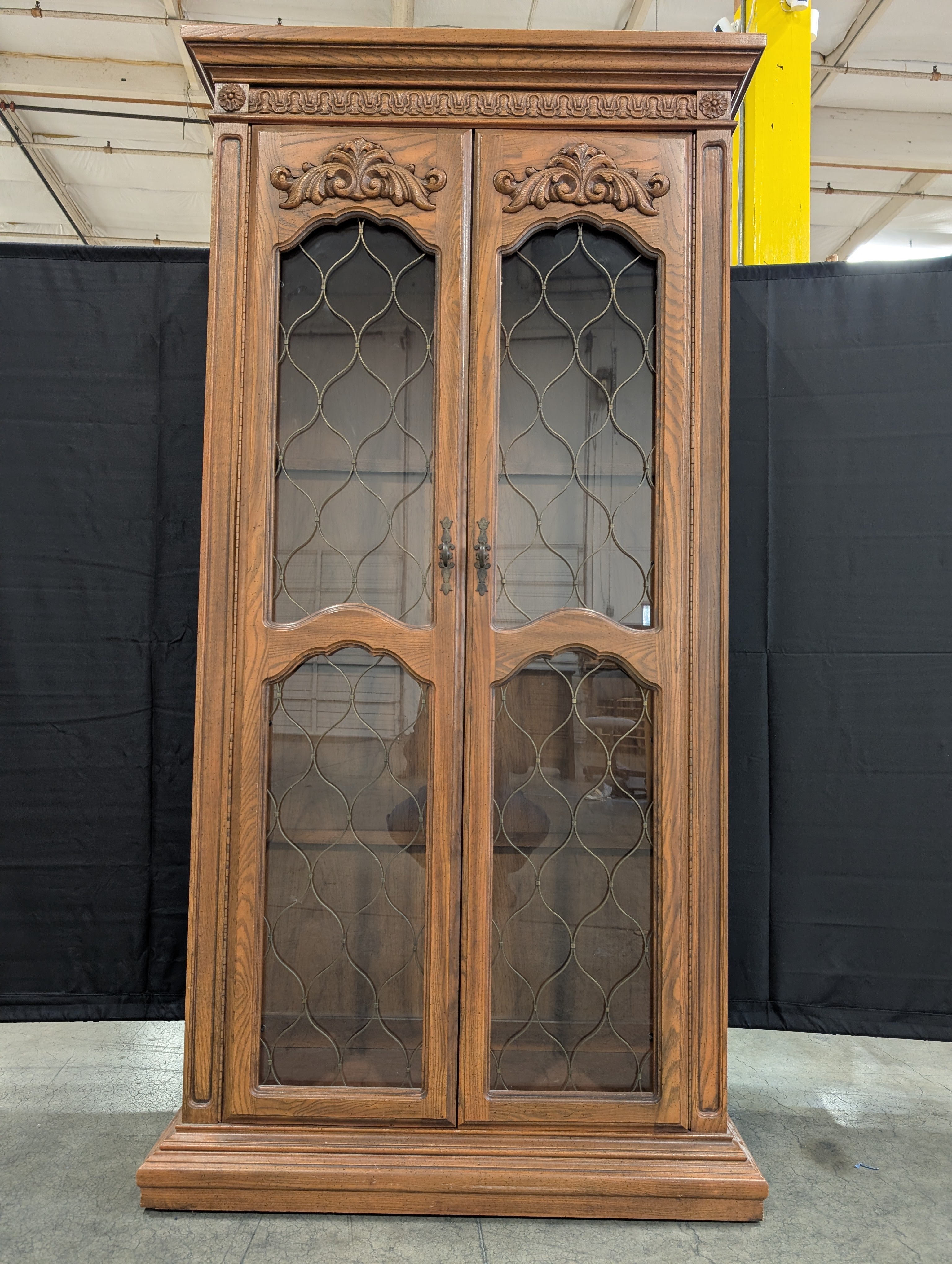 Ornate Wood Display Cabinet with Leaded Glass Doors