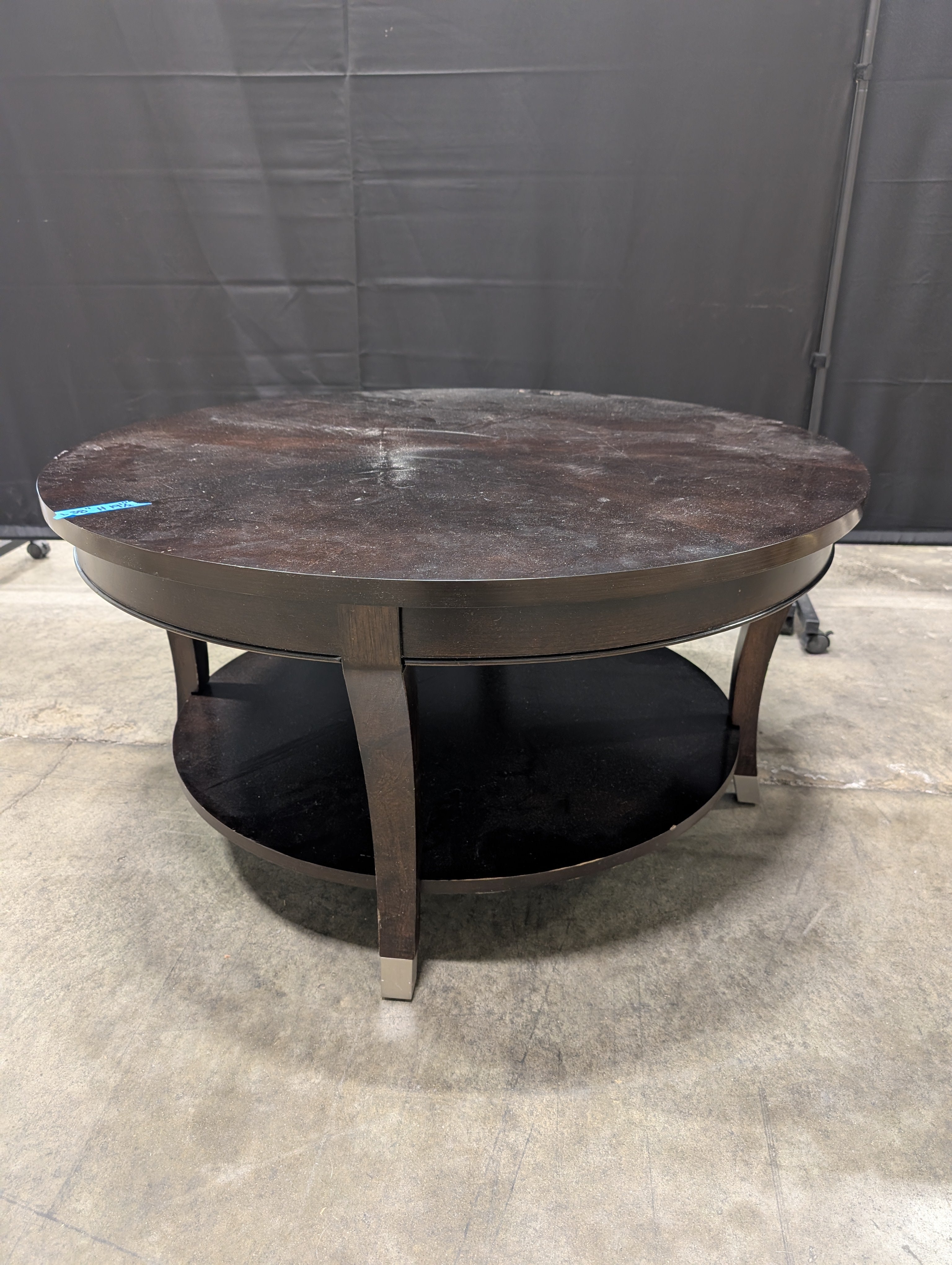 Contemporary Dark Wood Round Coffee Table with Lower Shelf
