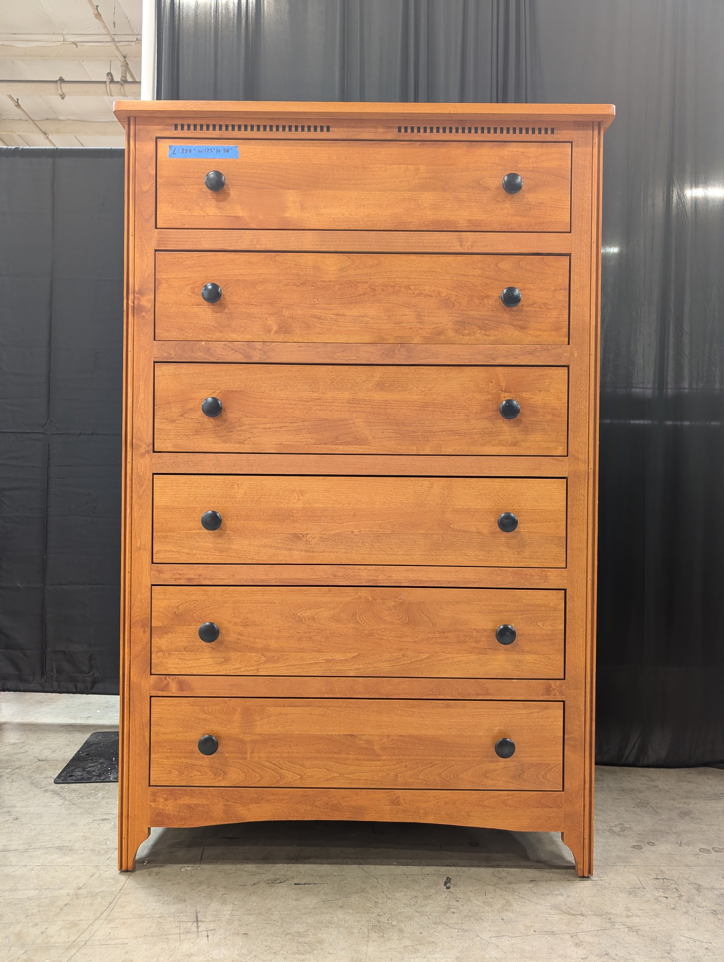 Warm Honey Wood Six-Drawer Dresser with Dark Knobs